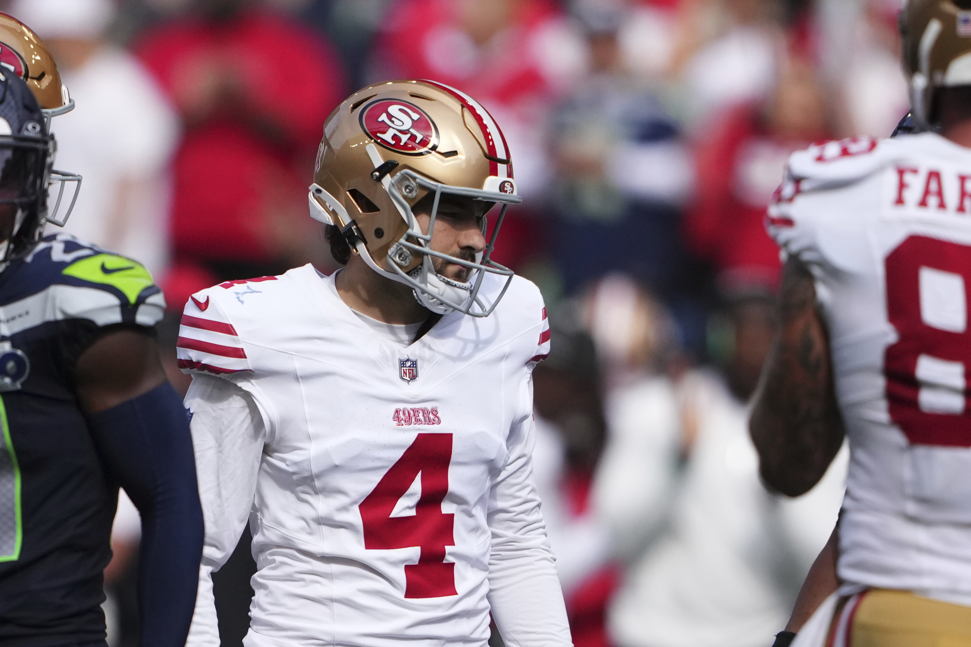 San Francisco 49ers place-kicker Jake Moody (4) reacts after making a field goal during the second half of an NFL football game against the Seattle Seahawks, Sunday, Sept. 7, 2025, in Seattle. 