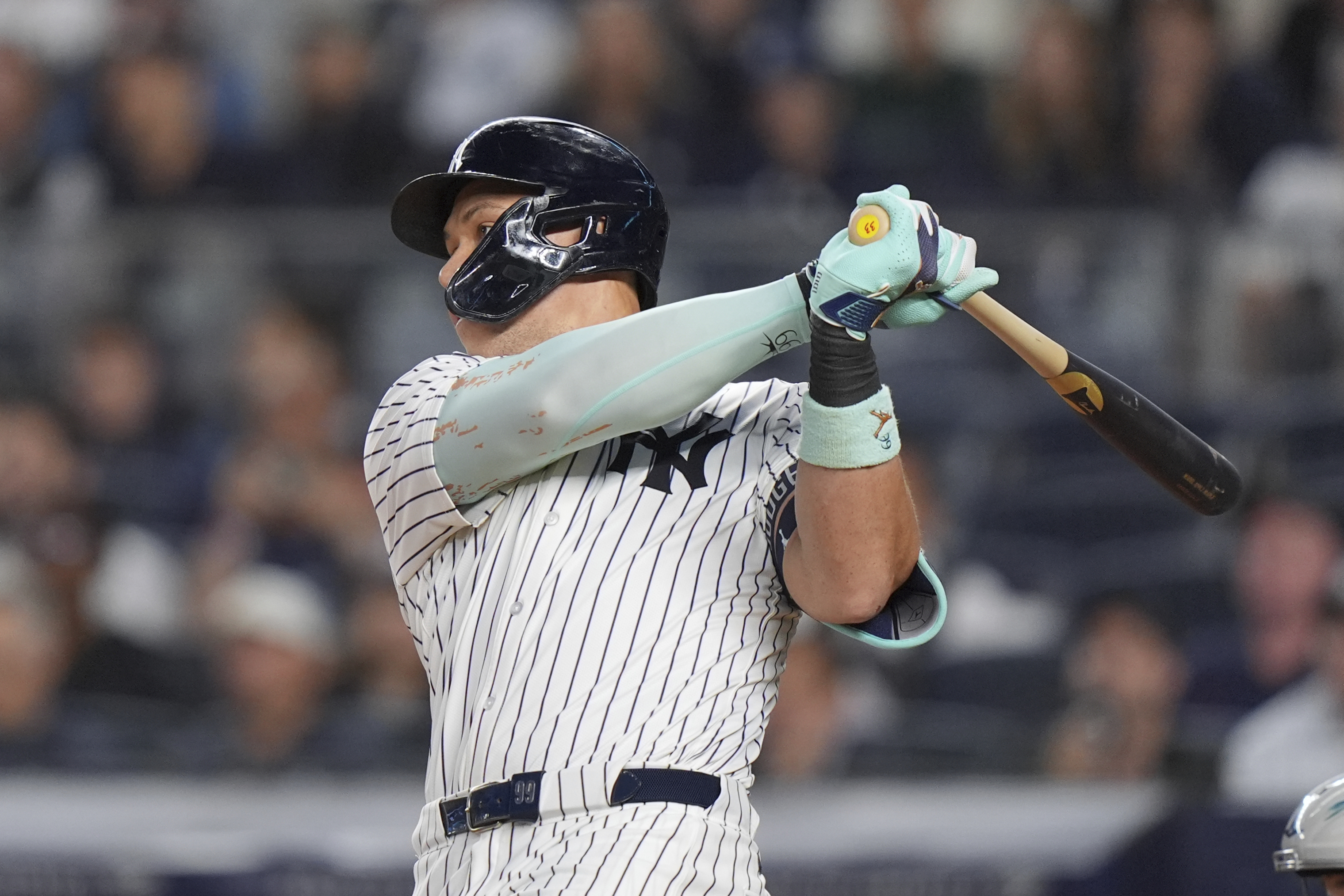 New York Yankees' Aaron Judge hits a home run during the first inning of a baseball game against the Detroit Tigers Tuesday, Sept. 9, 2025, in New York. 