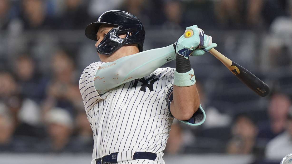 New York Yankees' Aaron Judge hits a home run during the first inning of a baseball game against the Detroit Tigers Tuesday, Sept. 9, 2025, in New York.