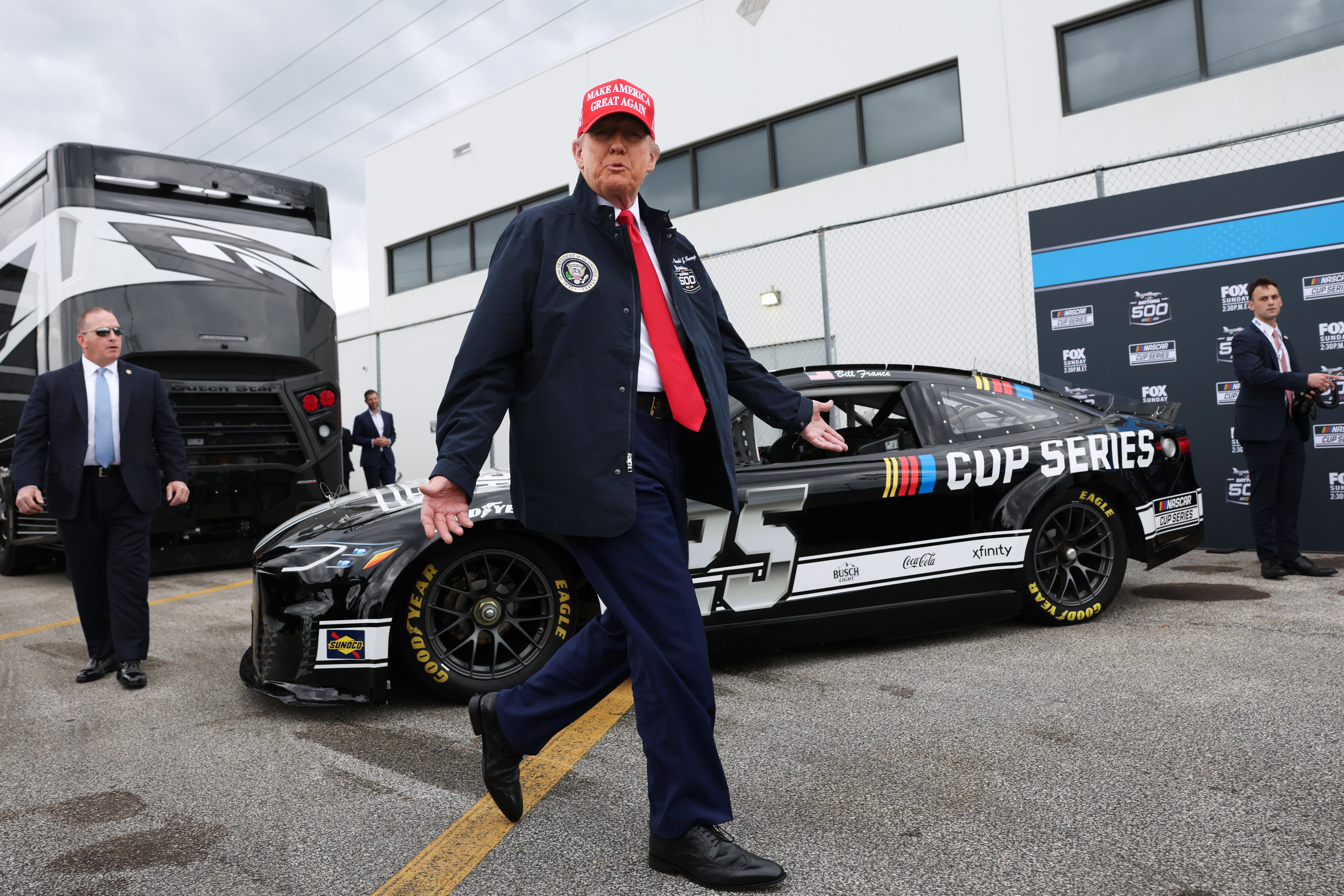 FILE - President Donald Trump attends the NASCAR Daytona 500 auto race at Daytona International Speedway, Feb. 16, 2025, in Daytona Beach, Fla. 