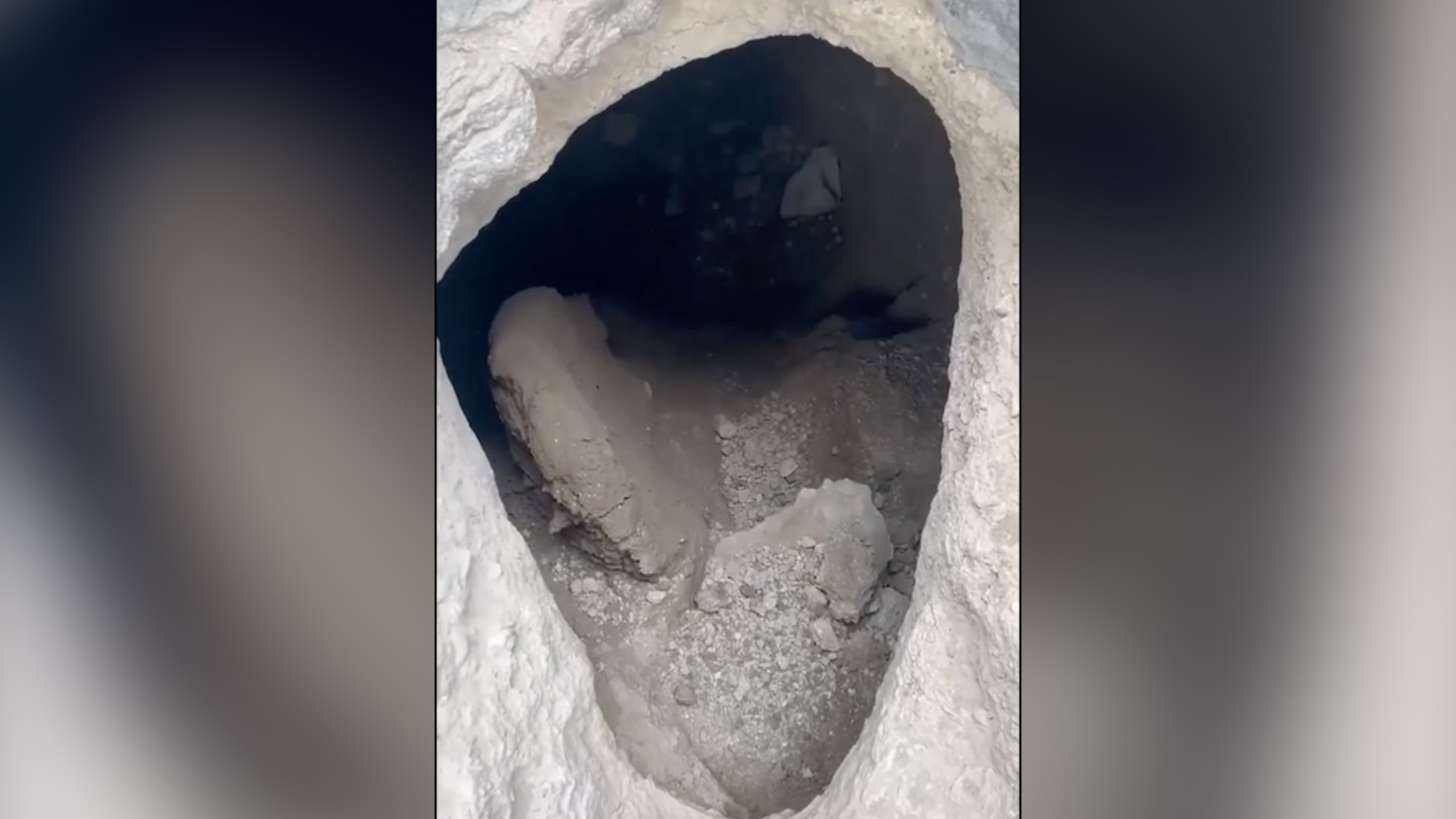 A man was arrested Tuesday after police say they found him inside a cave that he had dug along I-15, on Utah Department of Transportation property. UDOT plans to fill the large hole with cement on Thursday.