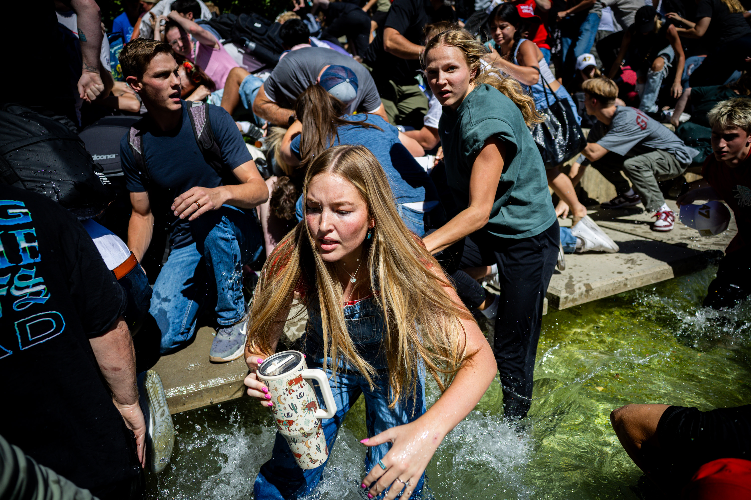 The crowd reacts after Charlie Kirk is shot during Turning Point USA’s visit to Utah Valley University in Orem on Sept. 10.