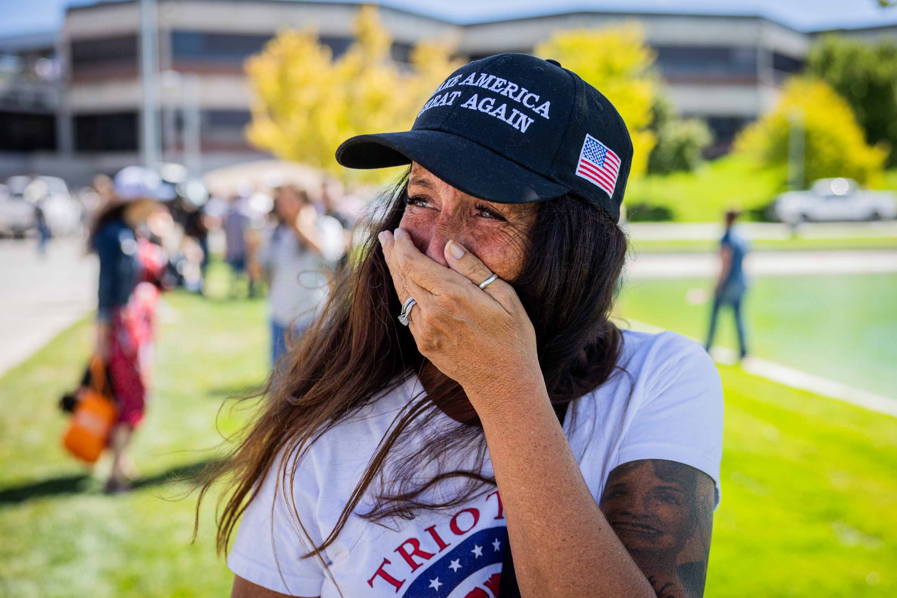 Allison Hemingway-Witty cries after Charlie Kirk is shot during Turning Point USA's visit to Utah Valley University in Orem on Wednesday.