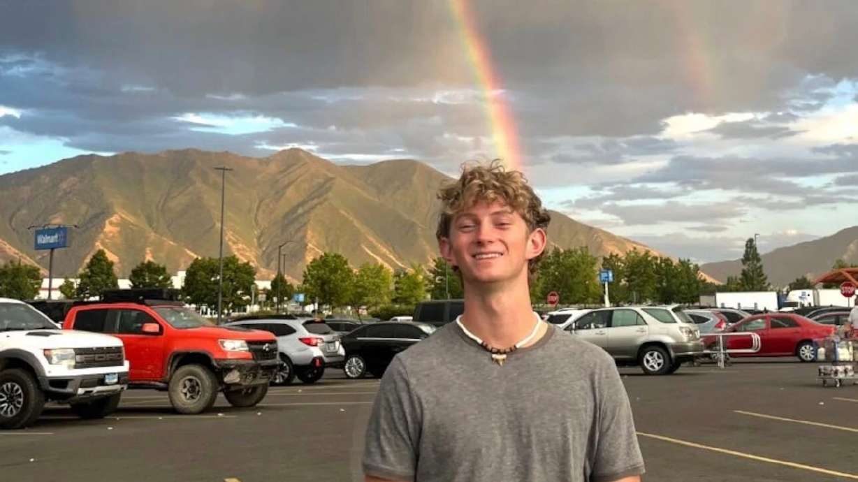 Micah LeFave stands in a parking lot in front of a rainbow in Cedar City. LeFave, who passed away last week after falling out of a moving vehicle, was an organ donor that saved five lives, his family said Tuesday.