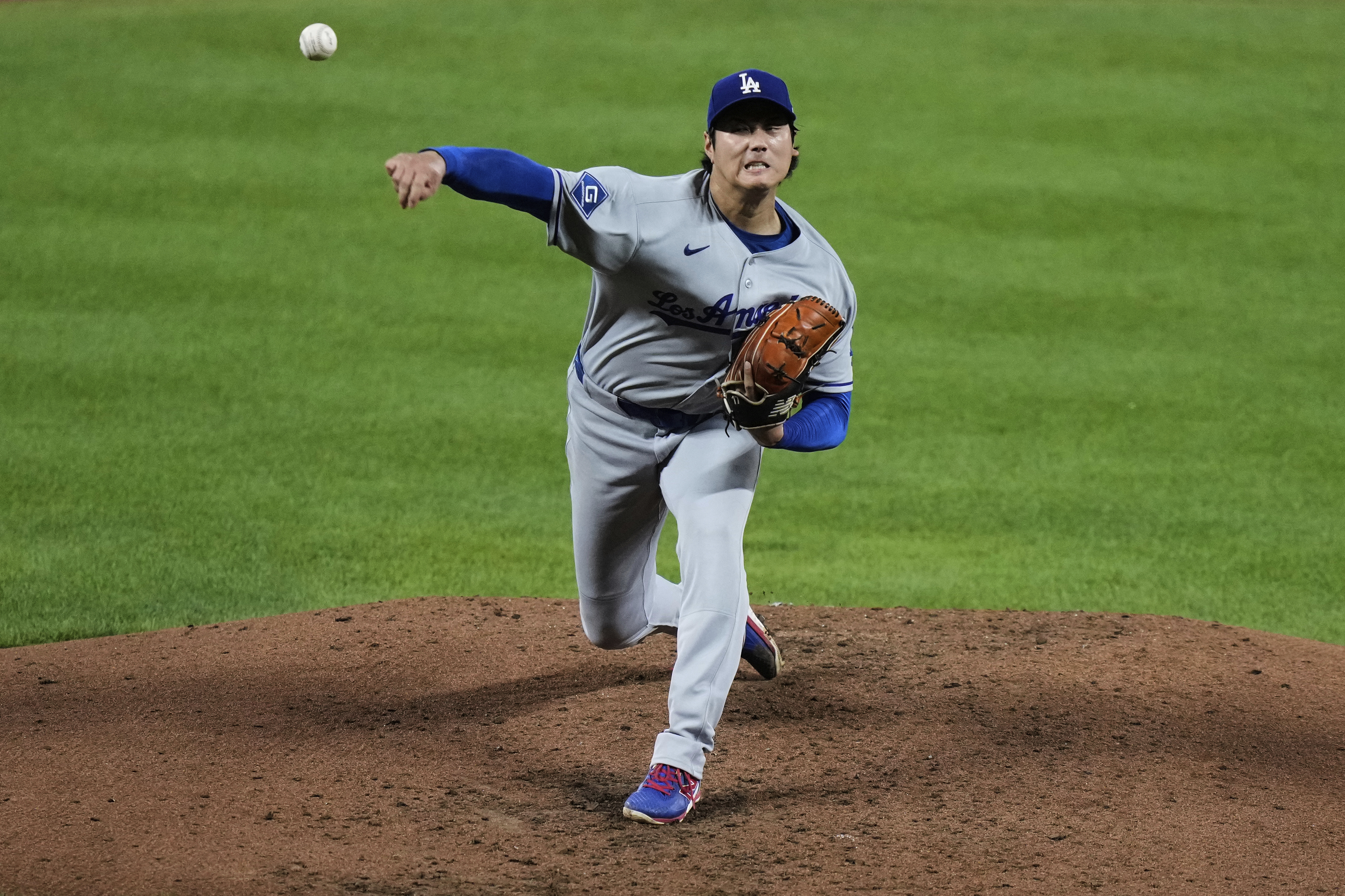 Los Angeles Dodgers starting pitcher Shohei Ohtani delivers during the third inning of a baseball game against the Baltimore Orioles, Friday, Sept. 5, 2025, in Baltimore. 