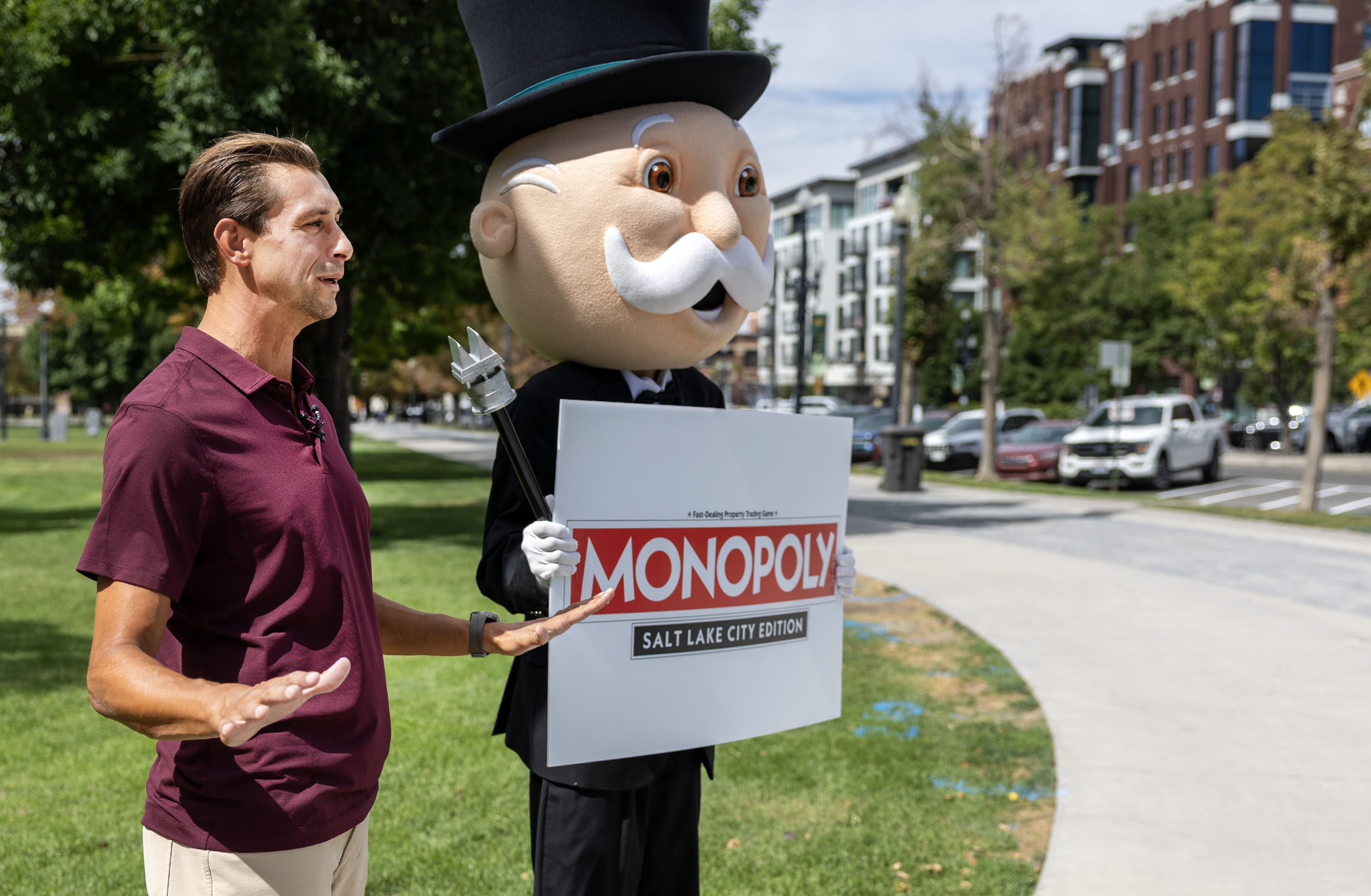 Aaron Green, a spokesperson for Top Trumps USA, and Mr. Monopoly make an announcement that a Monopoly: Salt Lake City Edition will debut in the summer of 2026 on Wednesday.