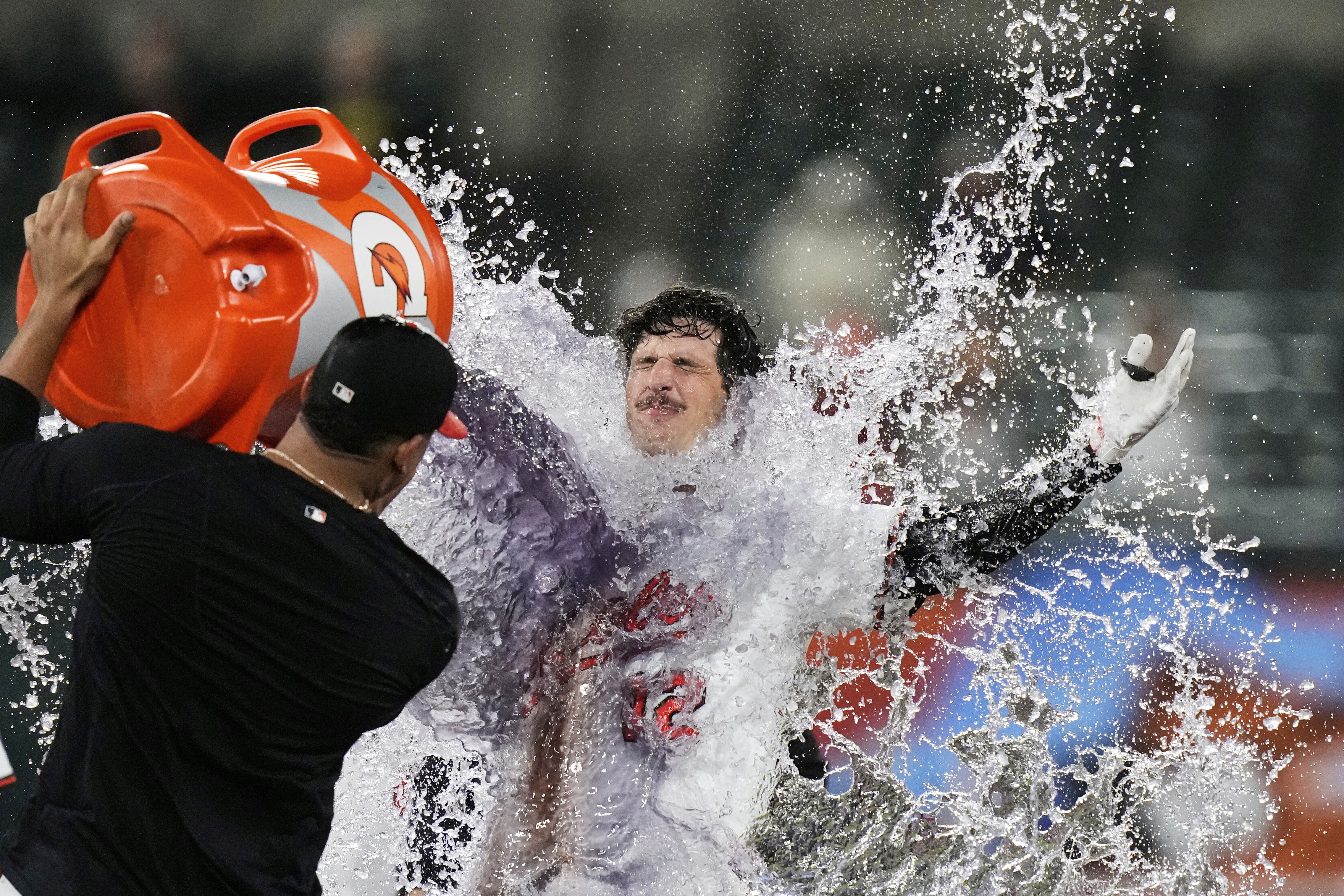 Baltimore Orioles' Dylan Beavers (12) is doused after hitting a walk-off single during the 10th inning of a baseball game against the Pittsburgh Pirates, Wednesday, Sept. 10, 2025, in Baltimore. 