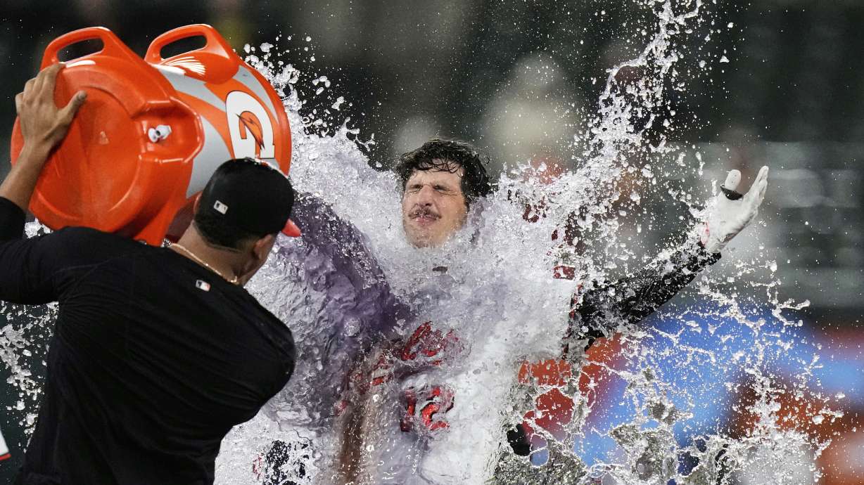 Baltimore Orioles' Dylan Beavers (12) is doused after hitting a walk-off single during the 10th inning of a baseball game against the Pittsburgh Pirates, Wednesday, Sept. 10, 2025, in Baltimore.