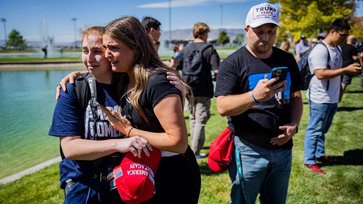 The crowd reacts after Charlie Kirk was shot during Turning Point USA’s visit to Utah Valley University in Orem on Wednesday.