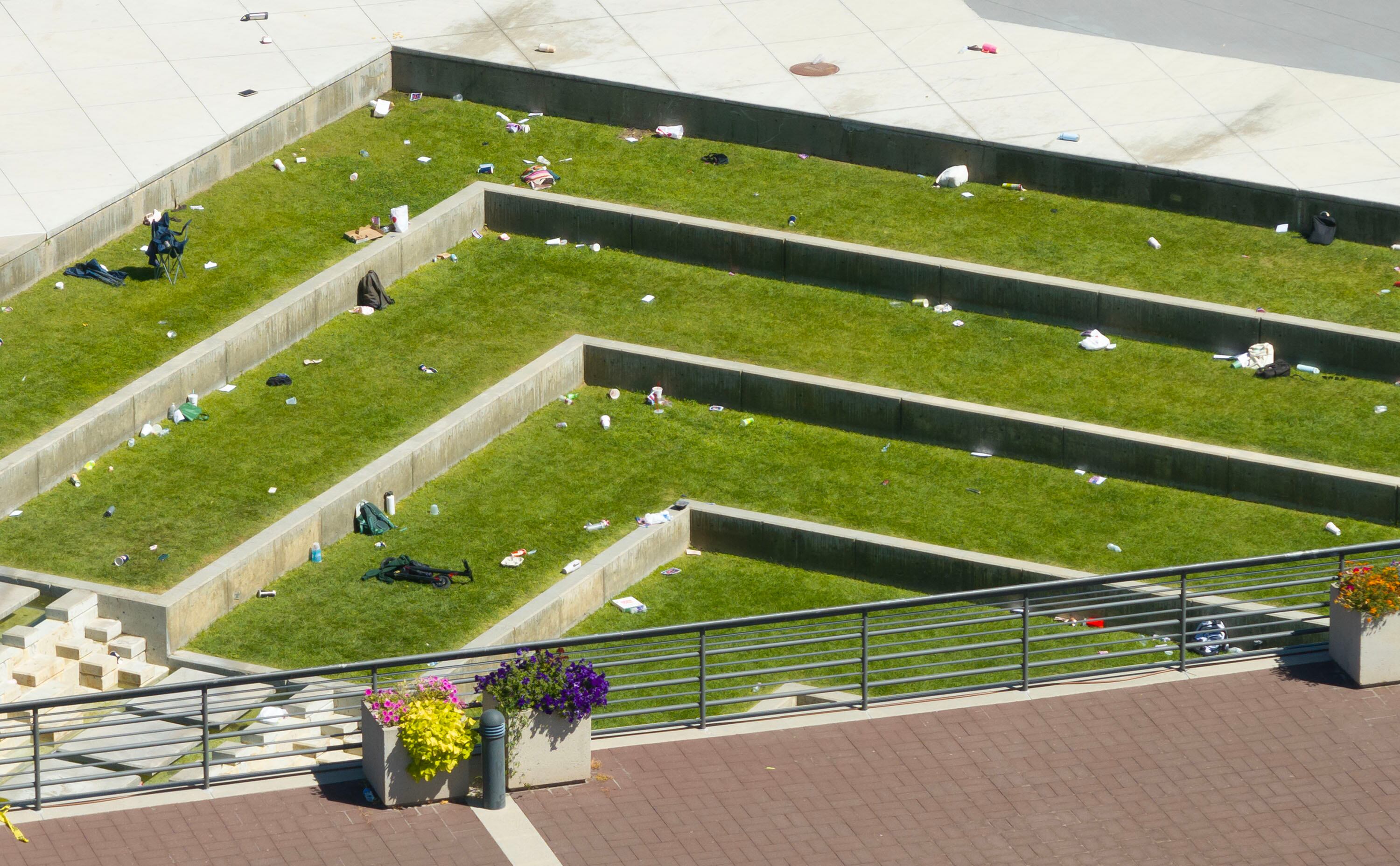People’s belongings remain at the scene following the shooting of conservative activist and Turning Point USA founder Charlie Kirk at Utah Valley University in Orem on Wednesday.