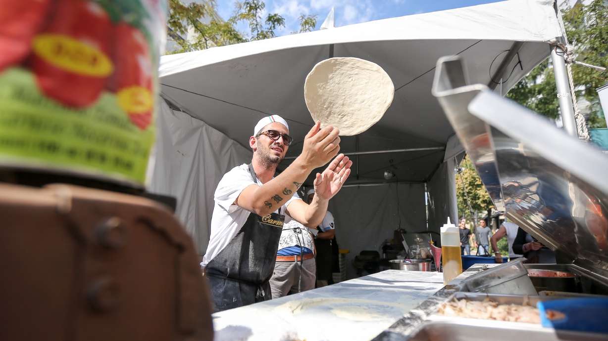 Carmine Bovi tosses pizza dough during Festa Italiana on Sept. 17, 2017. The Italian festival will be held Saturday and Sunday in Salt Lake City.