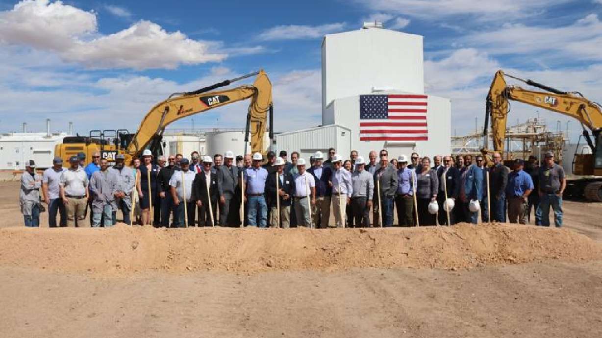 Attendees at the groundbreaking for American Pacific Corporation's planned $100 million expansion project northwest of Cedar City, Tuesday. The project is expected to increase production capacity by more than 50%.