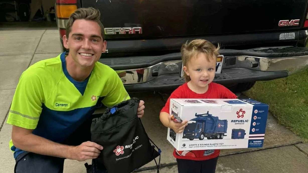 Cameron Esplin and Kodiak Hudson after Esplin gave Hudson a toy trash truck and a bag of goodies in Washington City, Aug. 22. Their brief exchanges recently turned into a celebration of community kindness.