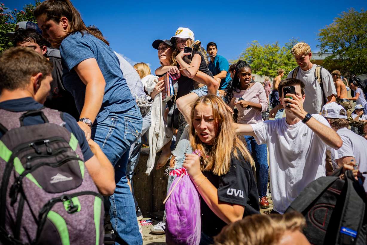 The crowd reacts after Charlie Kirk was shot during Turning Point USA’s visit to Utah Valley University in Orem on Wednesday, Sept. 10.