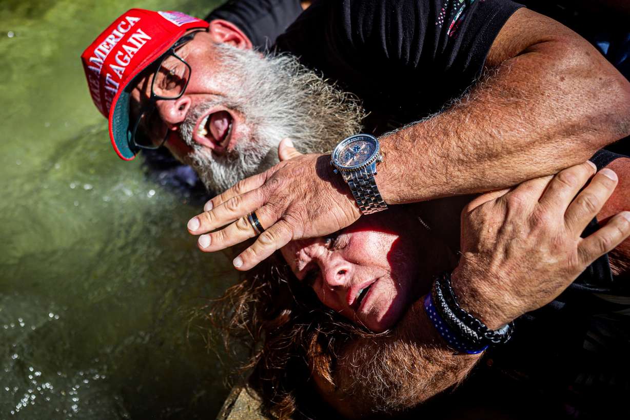 The crowd reacts after Charlie Kirk was shot during Turning Point USA’s visit to Utah Valley University in Orem on Wednesday, Sept. 10.
