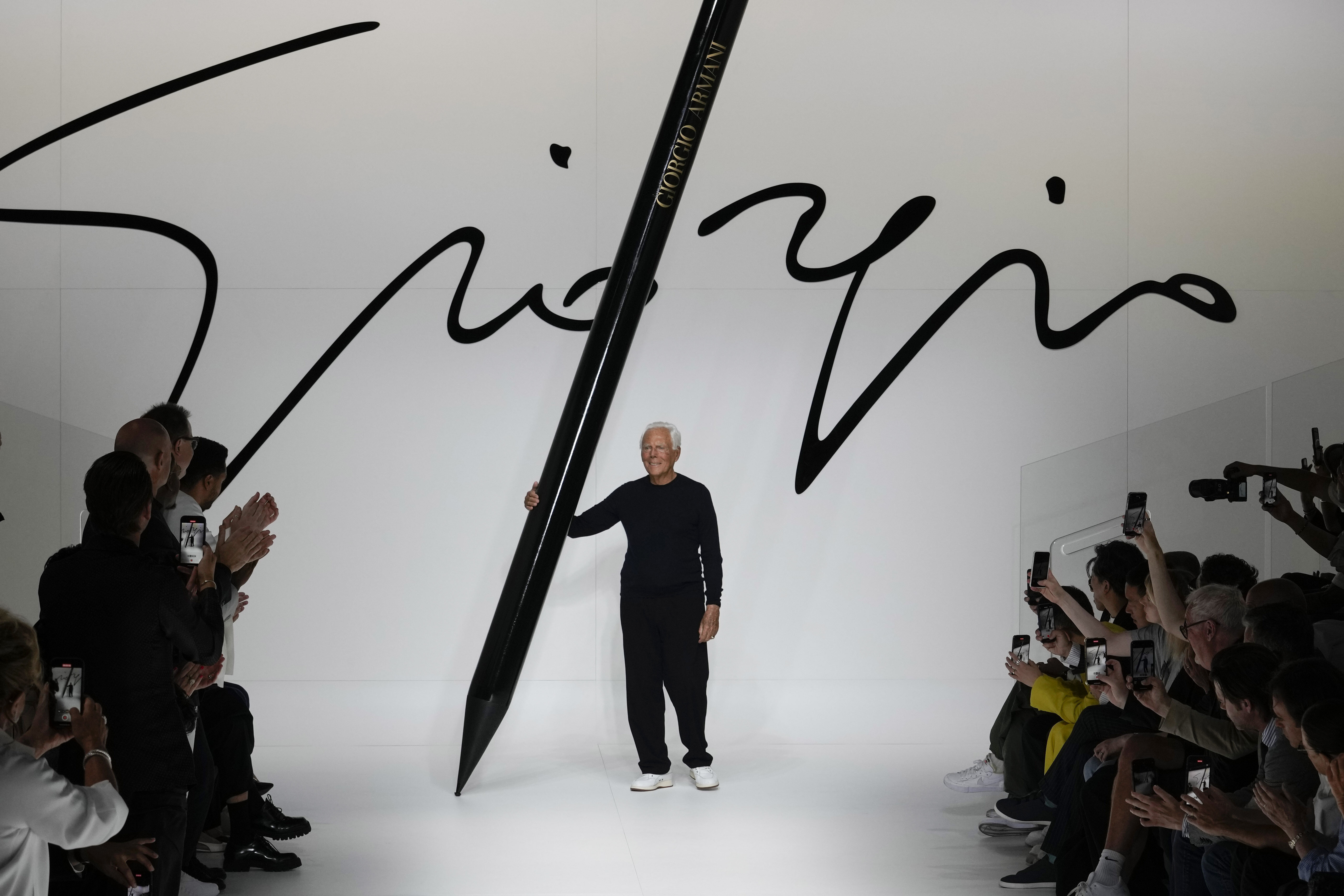 Designer Giorgio Armani at the end of the men's Spring Summer 2024 fashion show presented in Milan, Italy, June 19, 2023. Armani instructed his heirs to sell an initial 15% minority stake in his fashion empire Friday.