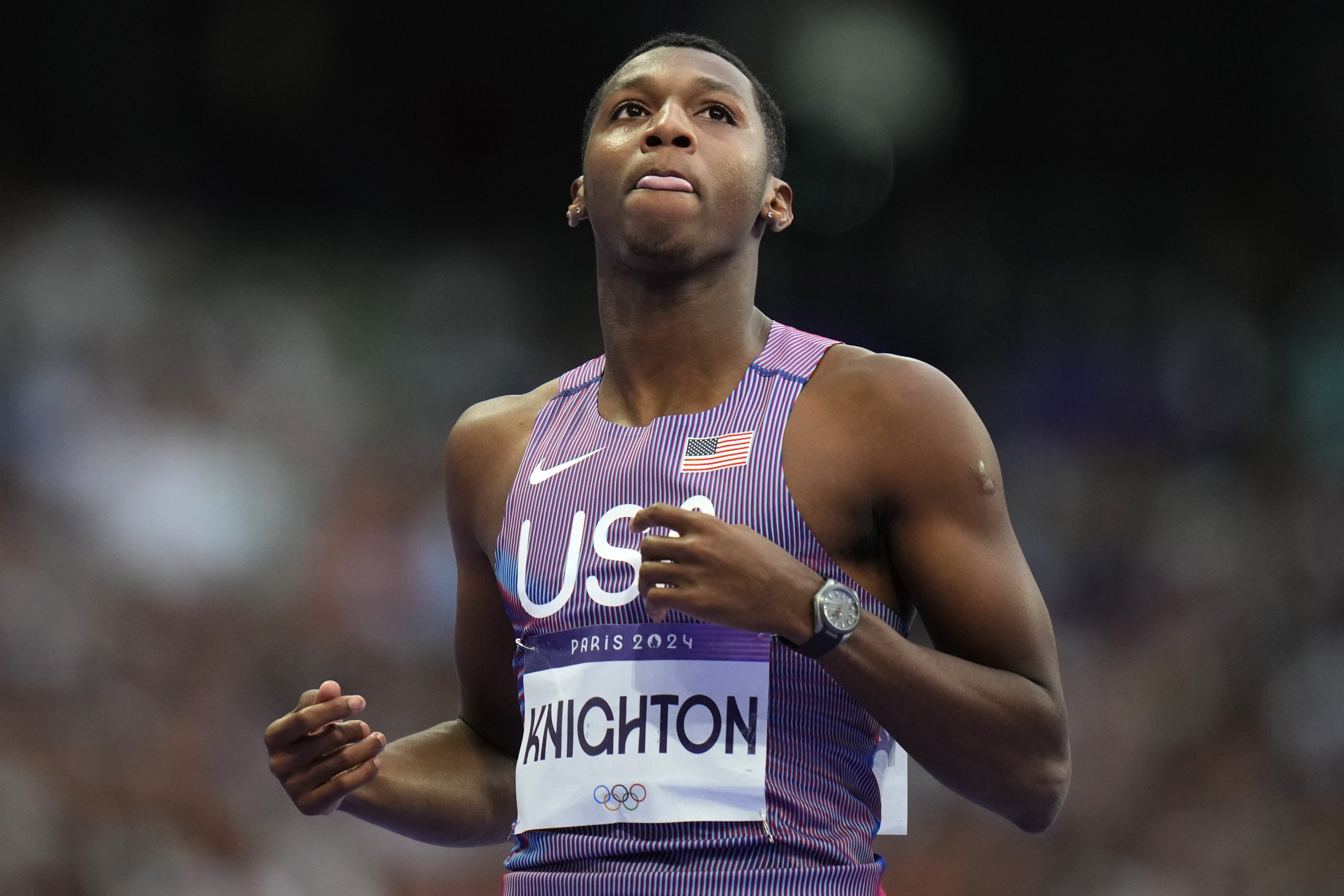 FILE - Erriyon Knighton, of the United States, reacts following his men's 200-meter semifinal at the 2024 Summer Olympics, on Aug. 7, 2024, in Saint-Denis, France.