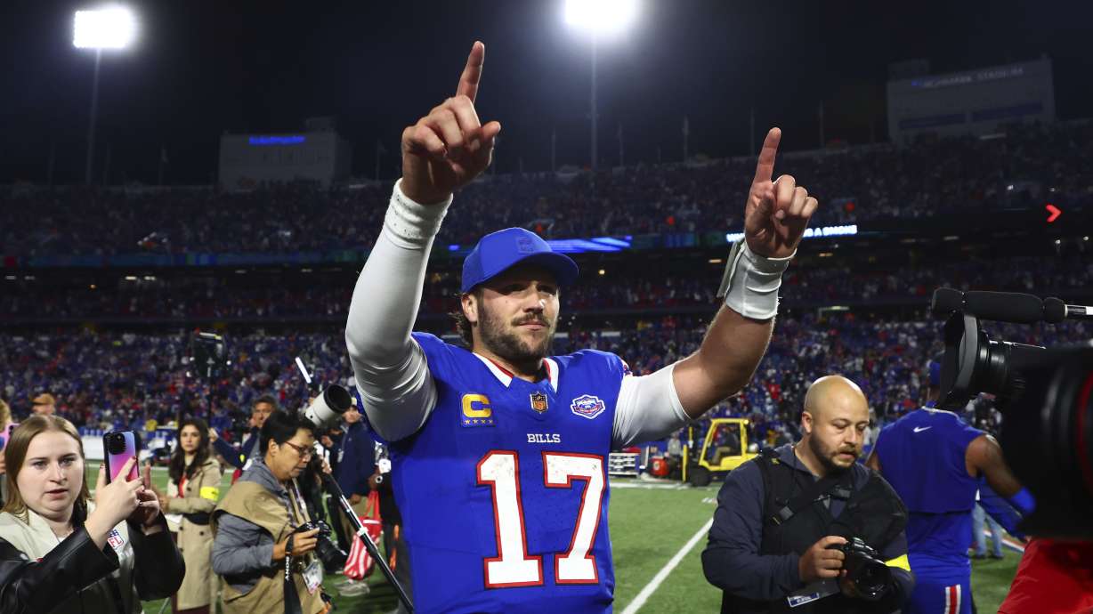 Buffalo Bills quarterback Josh Allen (17) celebrates the team's win over Baltimore Ravens in an NFL football game in Orchard Park, N.Y., Sunday, Sept. 7, 2025.
