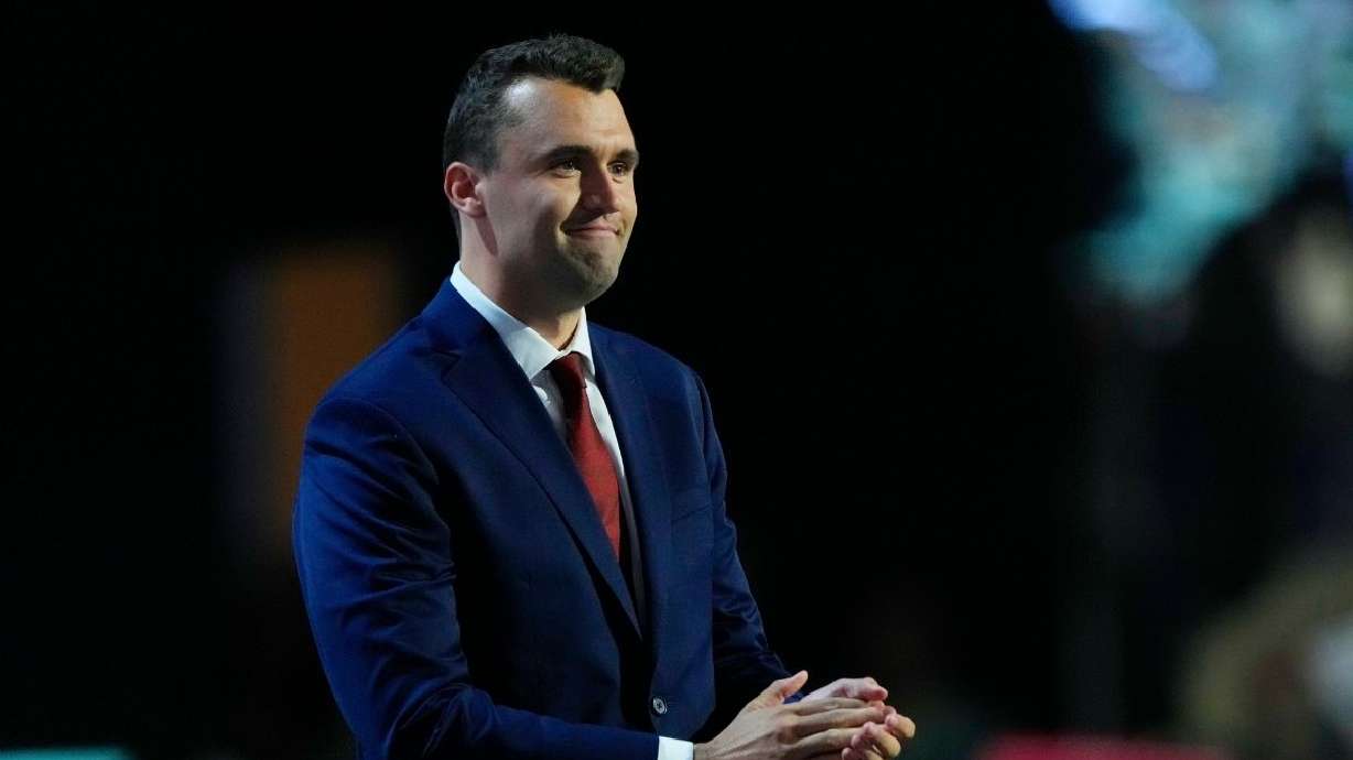 Charlie Kirk, co-founder of Turning Point USA, stands during microphone check before the start of the first day of the Republican National Convention, July 15, 2024, in Milwaukee.