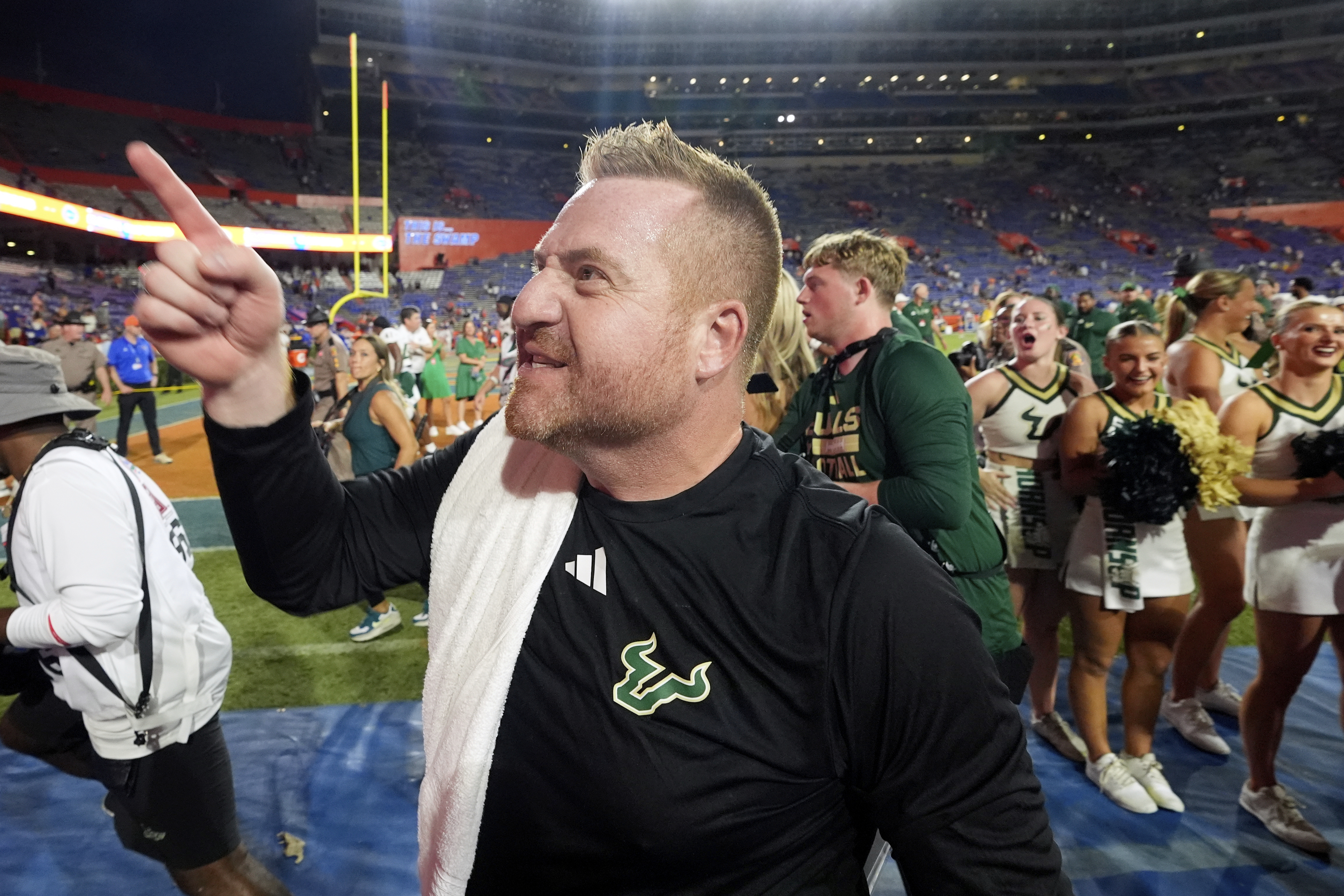 South Florida head coach Alex Golesh points to fans as he leaves the field as he celebrates defeating Florida in an NCAA college football game, Saturday, Sept. 6, 2025, in Gainesville, Fla. 