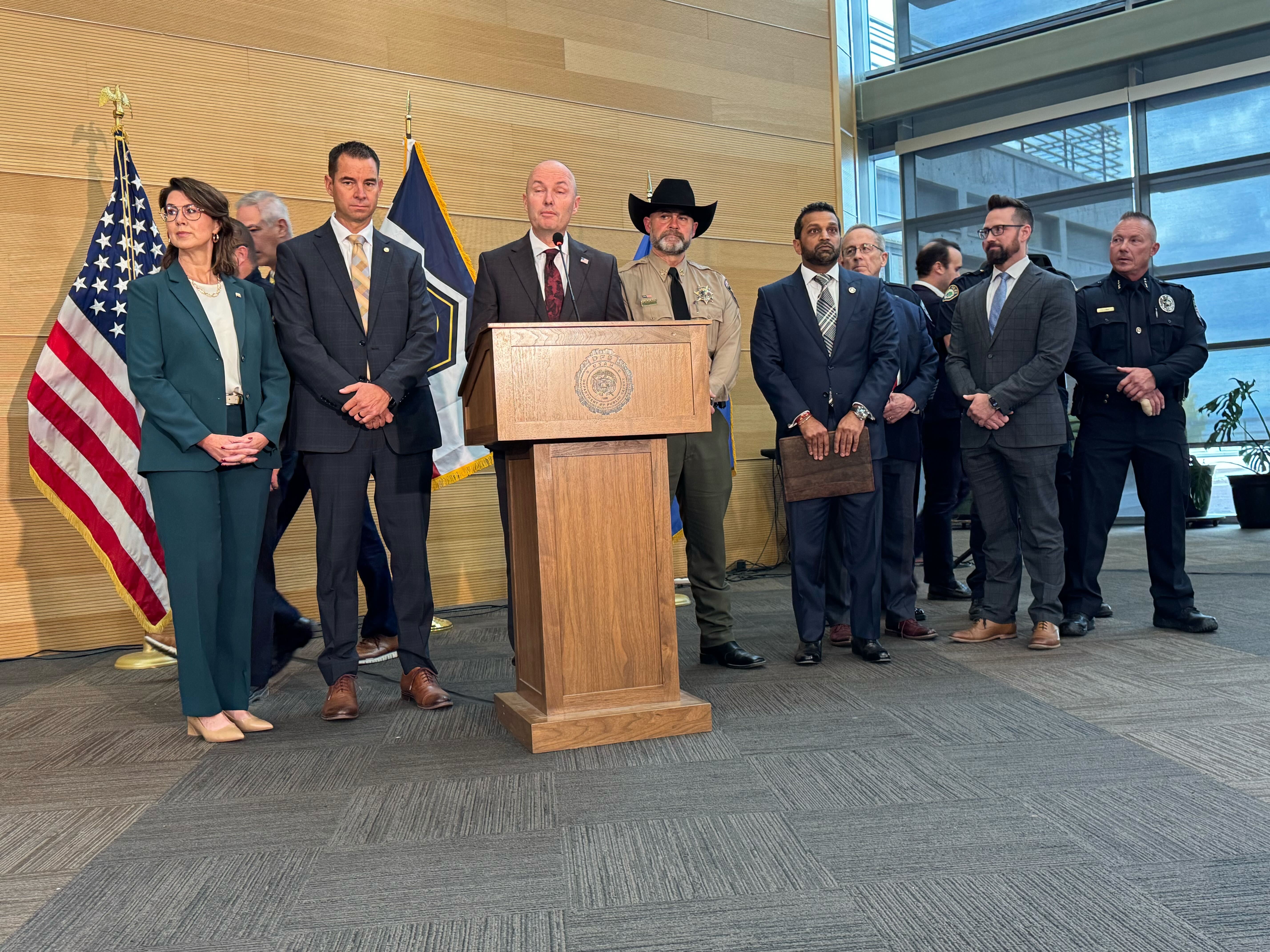 Gov. Spencer Cox speaks while joined by FBI Director Kash Patel and others during a press conference about the shooting death of Charlie Kirk at Utah Valley University in Orem on Friday.