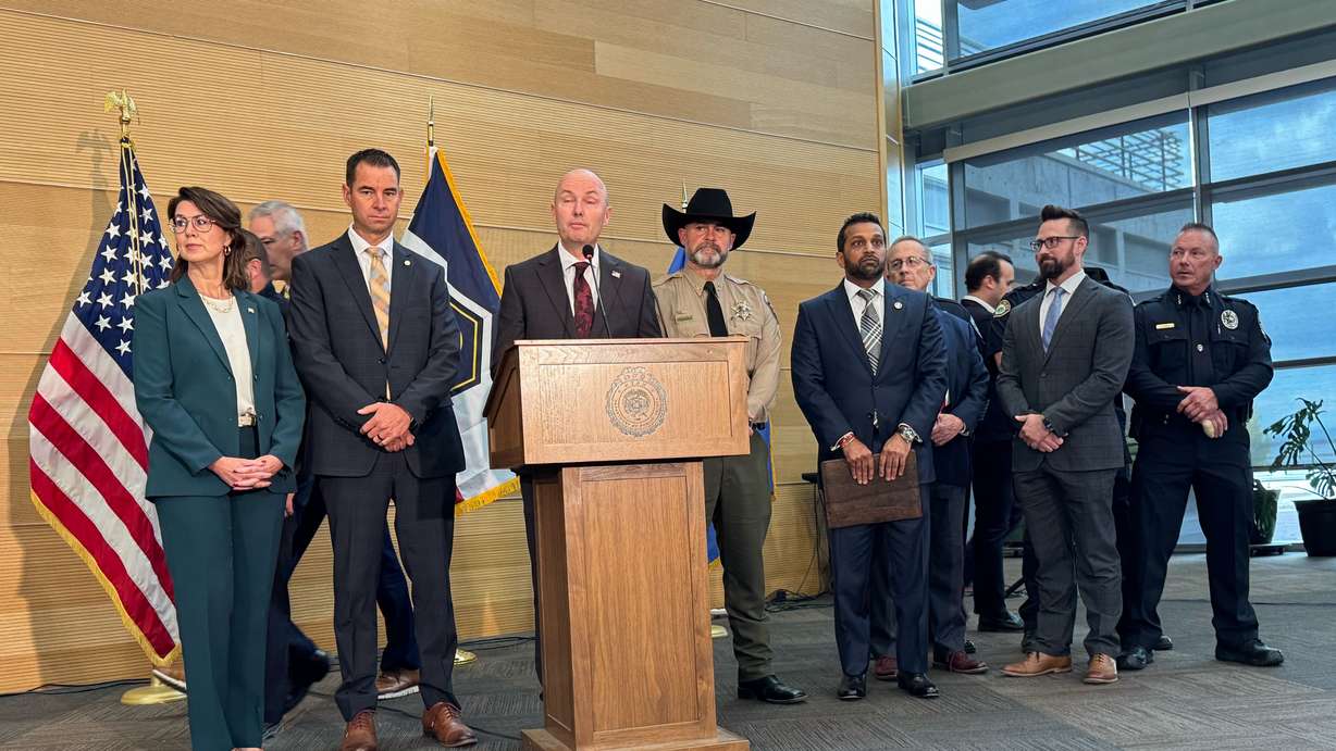 Gov. Spencer Cox speaks while joined by FBI Director Kash Patel and others during a press conference about the shooting death of Charlie Kirk at Utah Valley University in Orem on Friday.