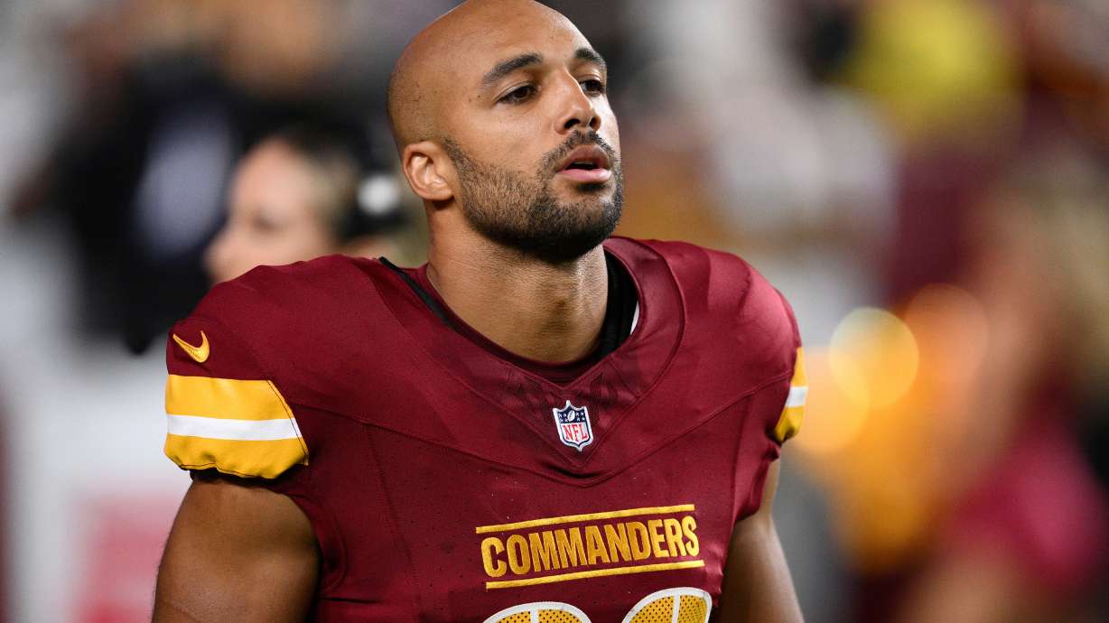 FILE - Washington Commanders running back Austin Ekeler (30) looks on before an NFL preseason football game against the Cincinnati Bengals, Monday, Aug. 18, 2025, in Landover, Md.