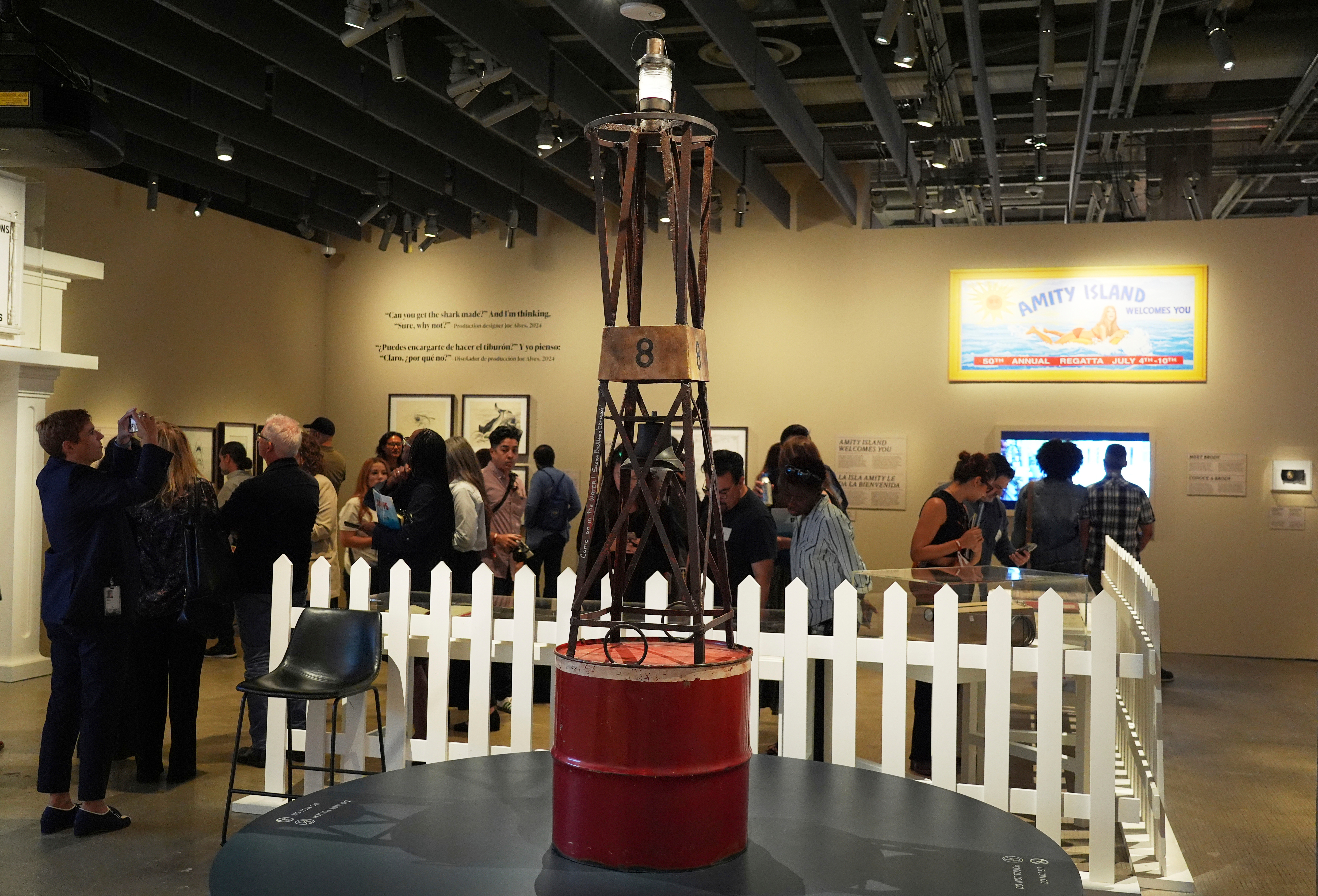 A prop buoy from the 1975 film "Jaws" is displayed for visitors at the "Jaws: The Exhibition" press preview on Wednesday at the Academy Museum of Motion Pictures in Los Angeles.