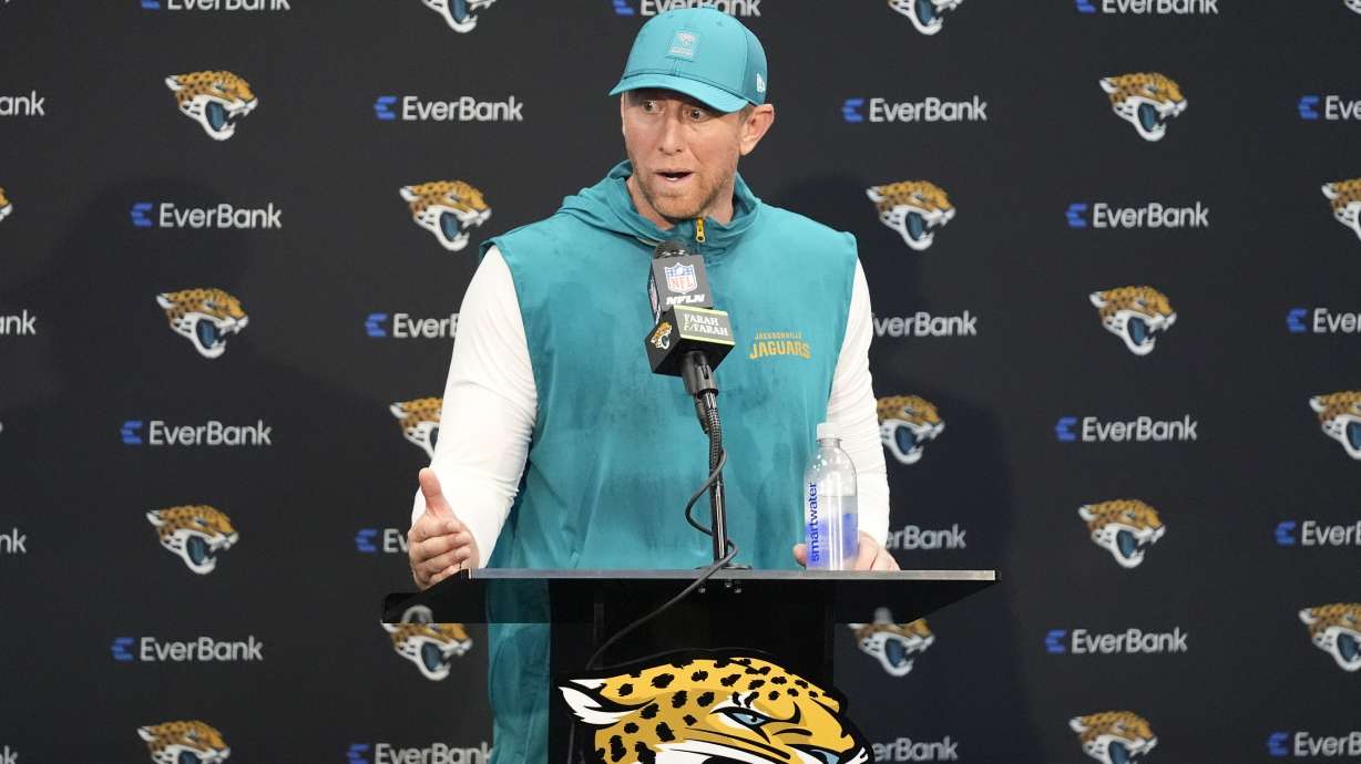 Jacksonville Jaguars head coach Liam Coen speaks at a news conference after an NFL football game against the Carolina Panthers, Sunday, Sept. 7, 2025, in Jacksonville, Fla.