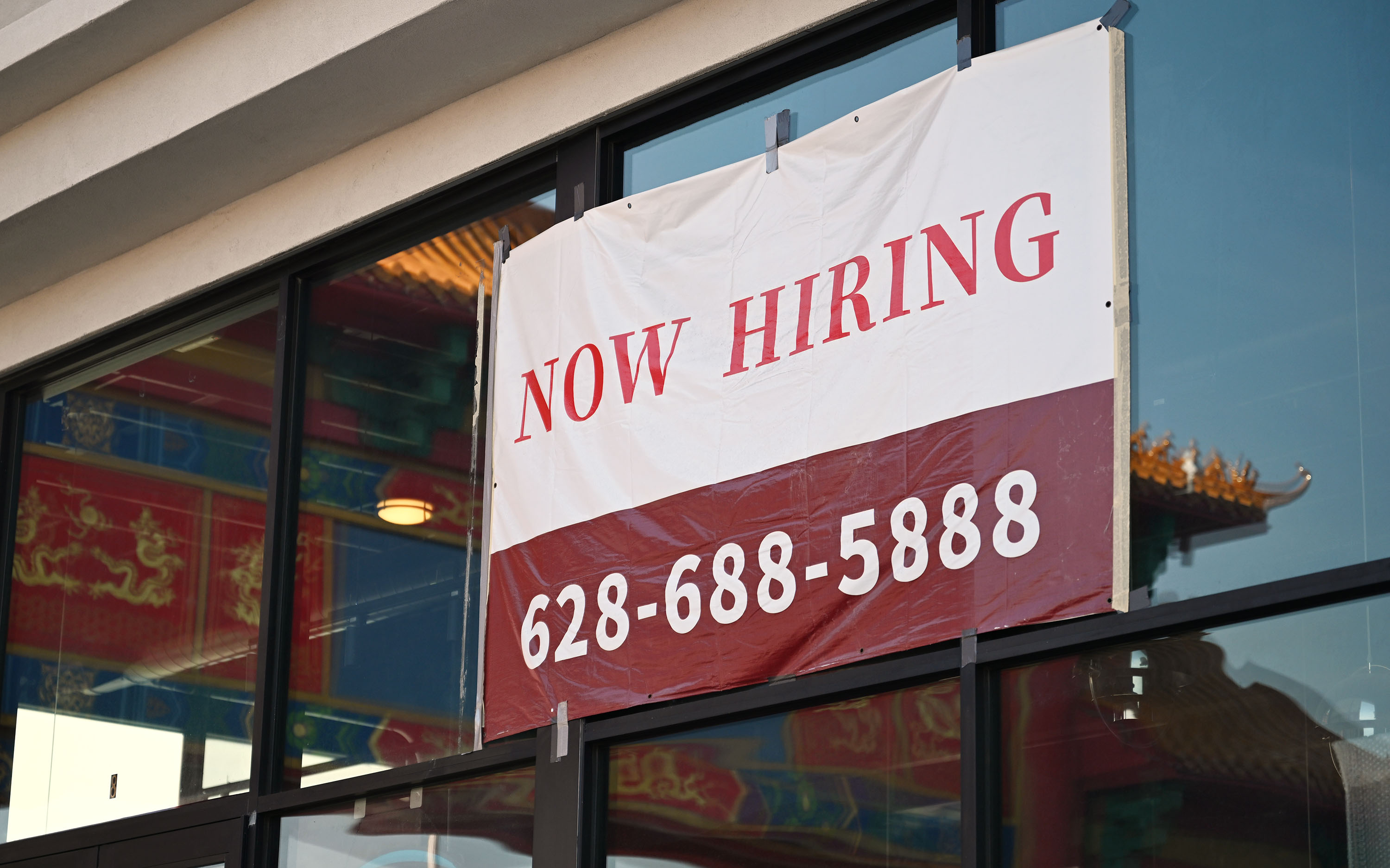 "Now Hiring" signs at a few locations in Salt Lake City on Dec. 4, 2024. Despite the slowing of the national job market and declining consumer sentiment, Utah is still in a good spot.