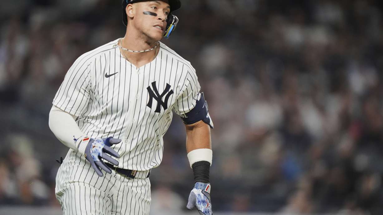 New York Yankees' Aaron Judge runs to first base for a single during the sixth inning of a baseball game against the Detroit Tigers Thursday, Sept. 11, 2025, in New York.