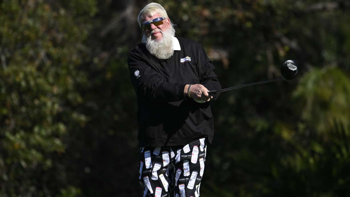 FILE - John Daly tees off on the second hole during the final round of the PNC Championship golf tournament, Sunday, Dec. 22, 2024, in Orlando, Fla.