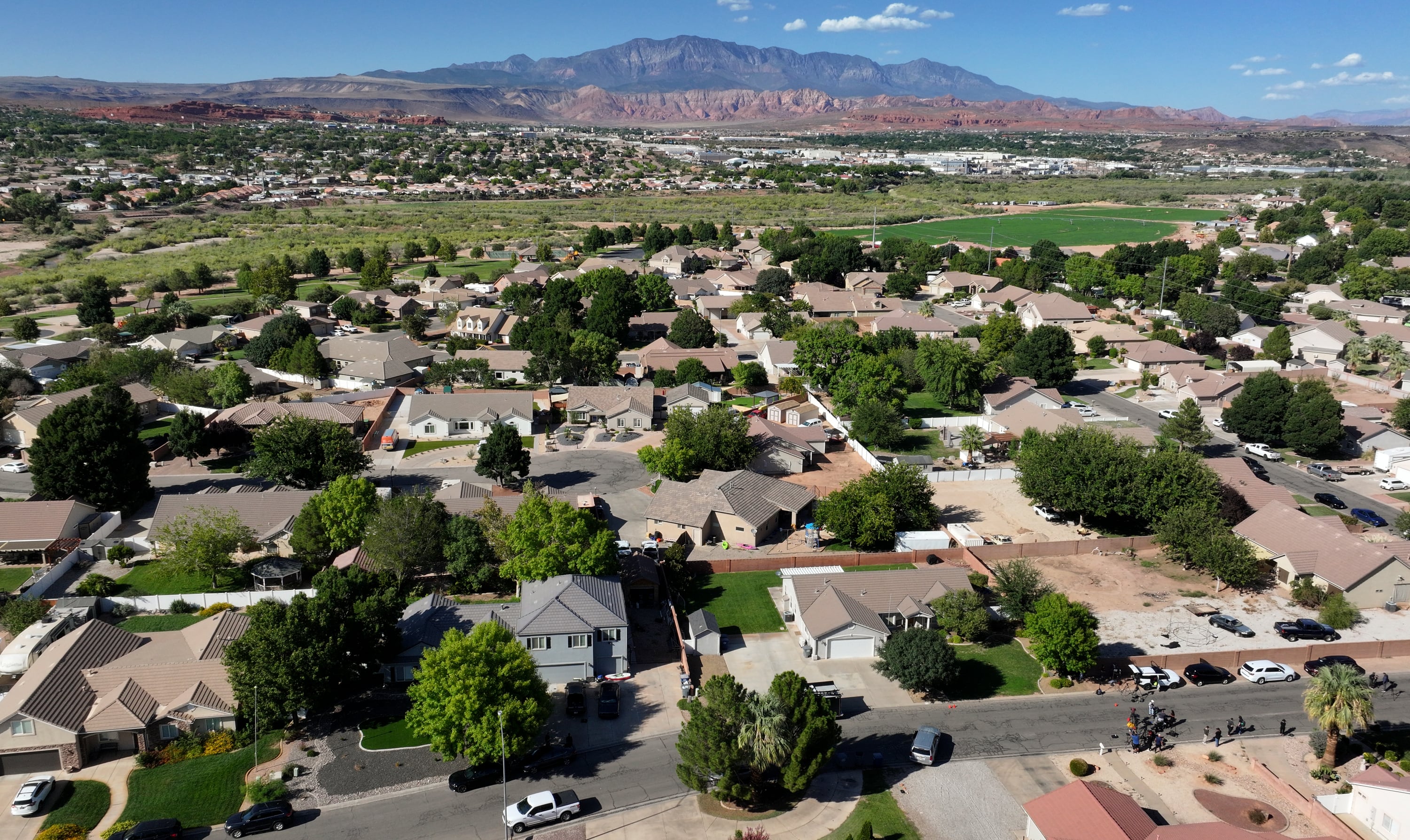 The family home of Tyler Robinson, who is the suspect in the Utah Valley University killing of Charlie Kirk, is pictured in Washington, Utah, on Friday. The house is blue and in the lower left of the image.