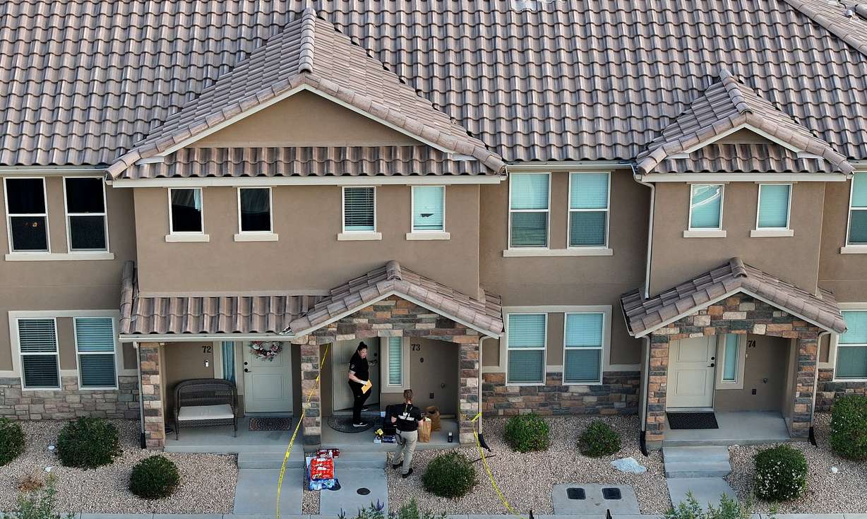 Department of Public Safety forensics workers work at the apartment of Tyler Robinson, who is the suspect in the Utah Valley University killing of Charlie Kirk, in St. George on Friday.