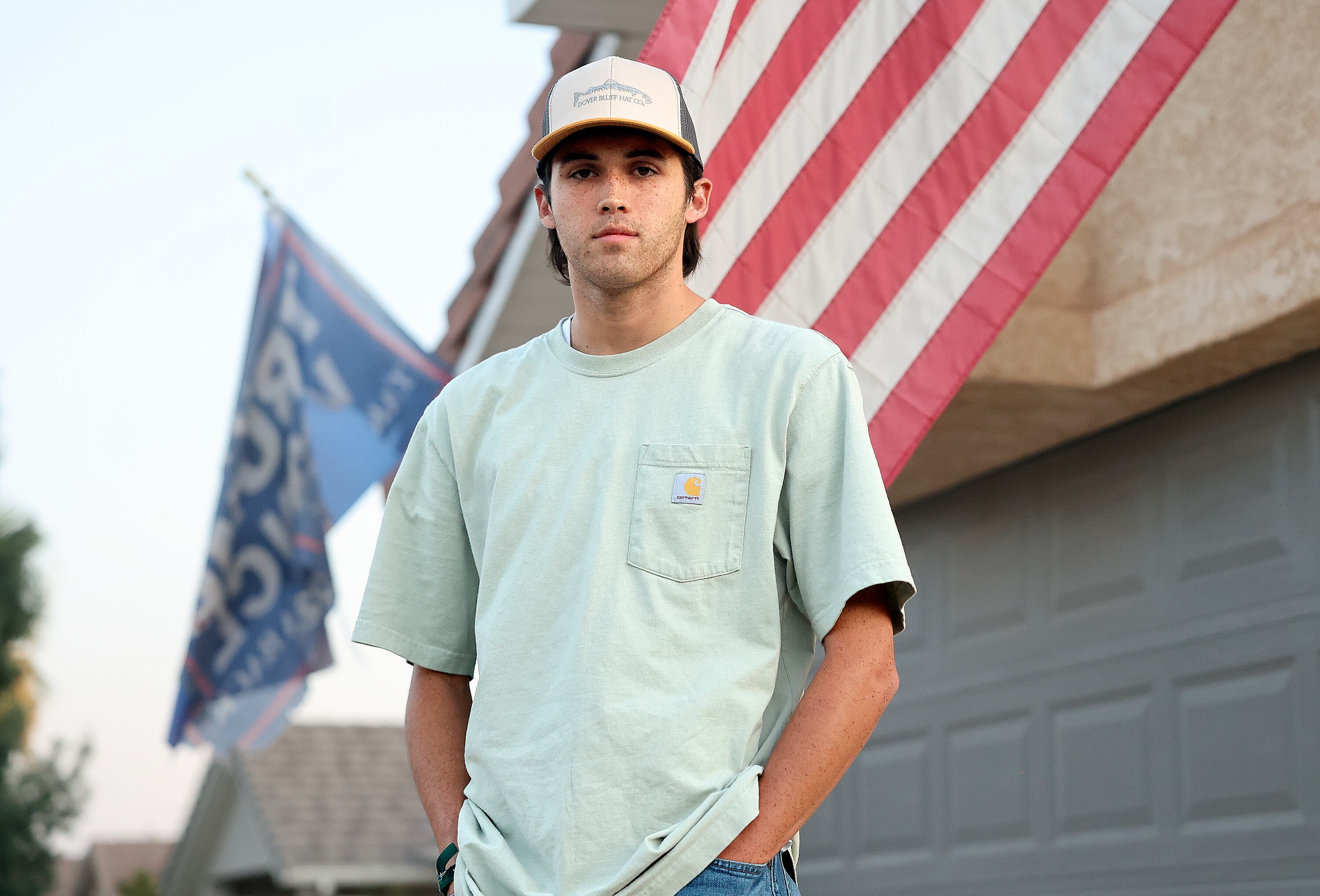Tate Conrad, who grew up going to Boy Scouts with Tyler Robinson, the suspected killer of Charlie Kirk, poses for a portrait outside of his home in Washington on Friday.