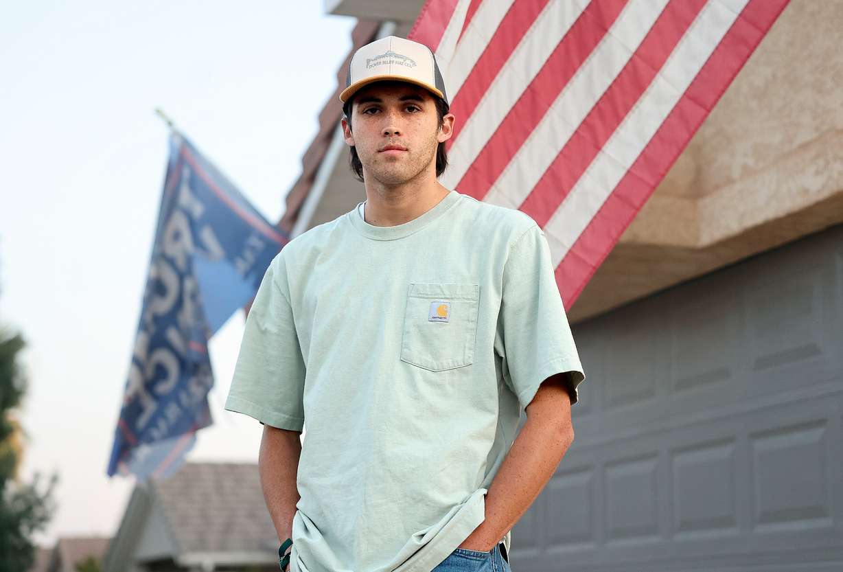 Tate Conrad, who grew up going to Boy Scouts with Tyler Robinson, the suspected killer of Charlie Kirk, poses for a portrait outside of his home in Washington on Friday.