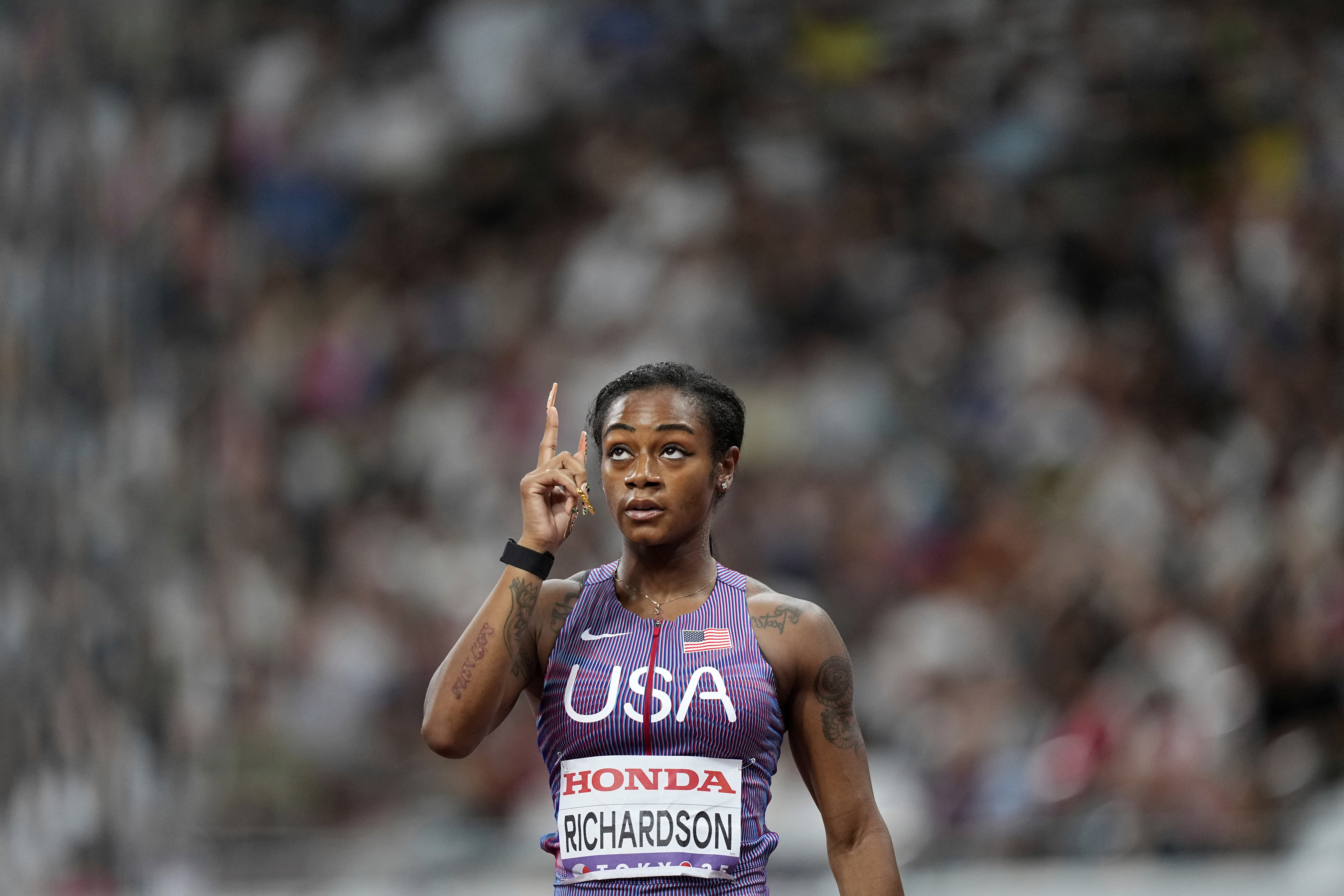 United States' Sha'Carri Richardson gestures after finishing a women's 100 meters heat at the World Athletics Championships in Tokyo, Saturday, Sept. 13, 2025. 