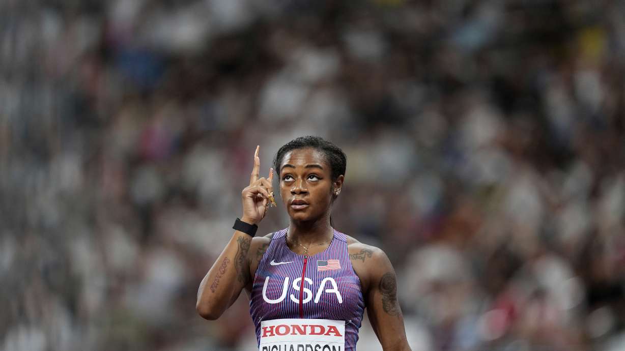 United States' Sha'Carri Richardson gestures after finishing a women's 100 meters heat at the World Athletics Championships in Tokyo, Saturday, Sept. 13, 2025.