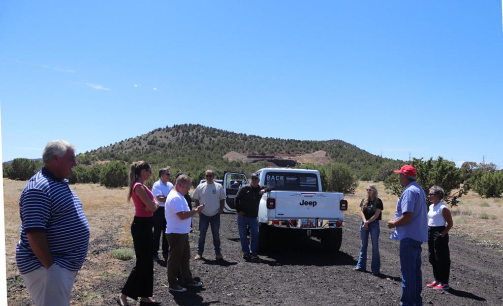 The Washington County Planning Commission visits an open cinder pit mine in the town of Central. Property owner Bryce Christensen wishes to obtain county approval to mine the cinders despite the protest of area residents.