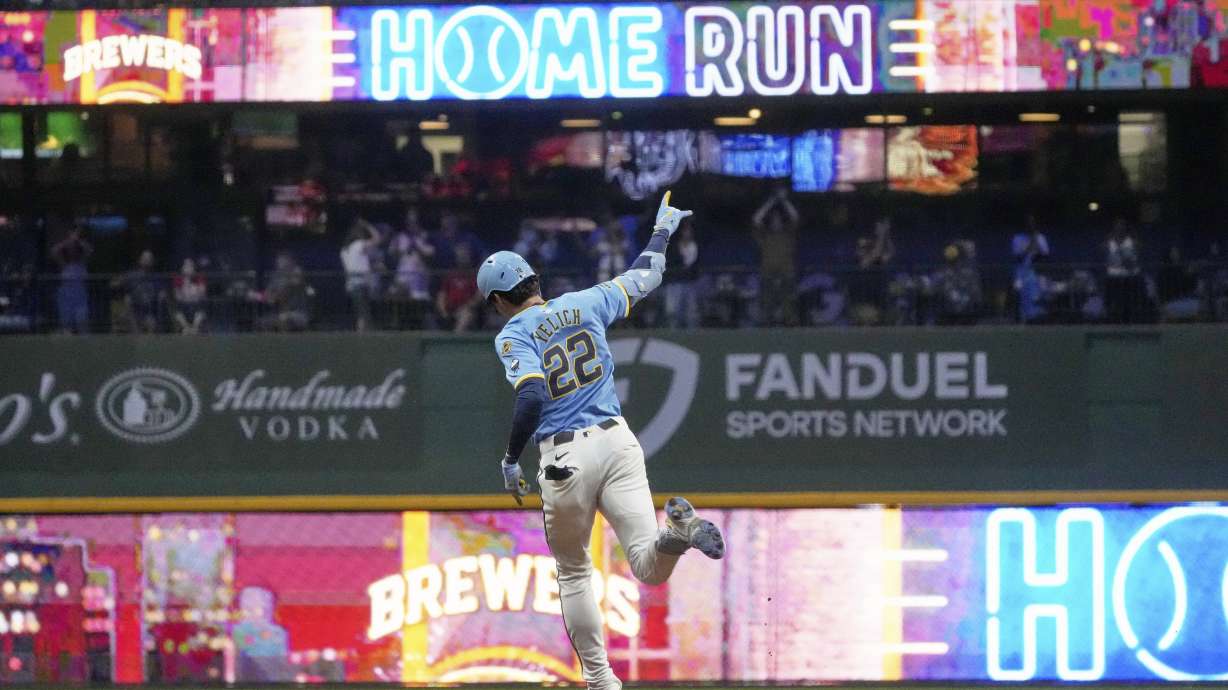 Milwaukee Brewers' Christian Yelich hits a two-run home run during the seventh inning of a baseball game against the St. Louis Cardinals Friday, Sept. 12, 2025, in Milwaukee.