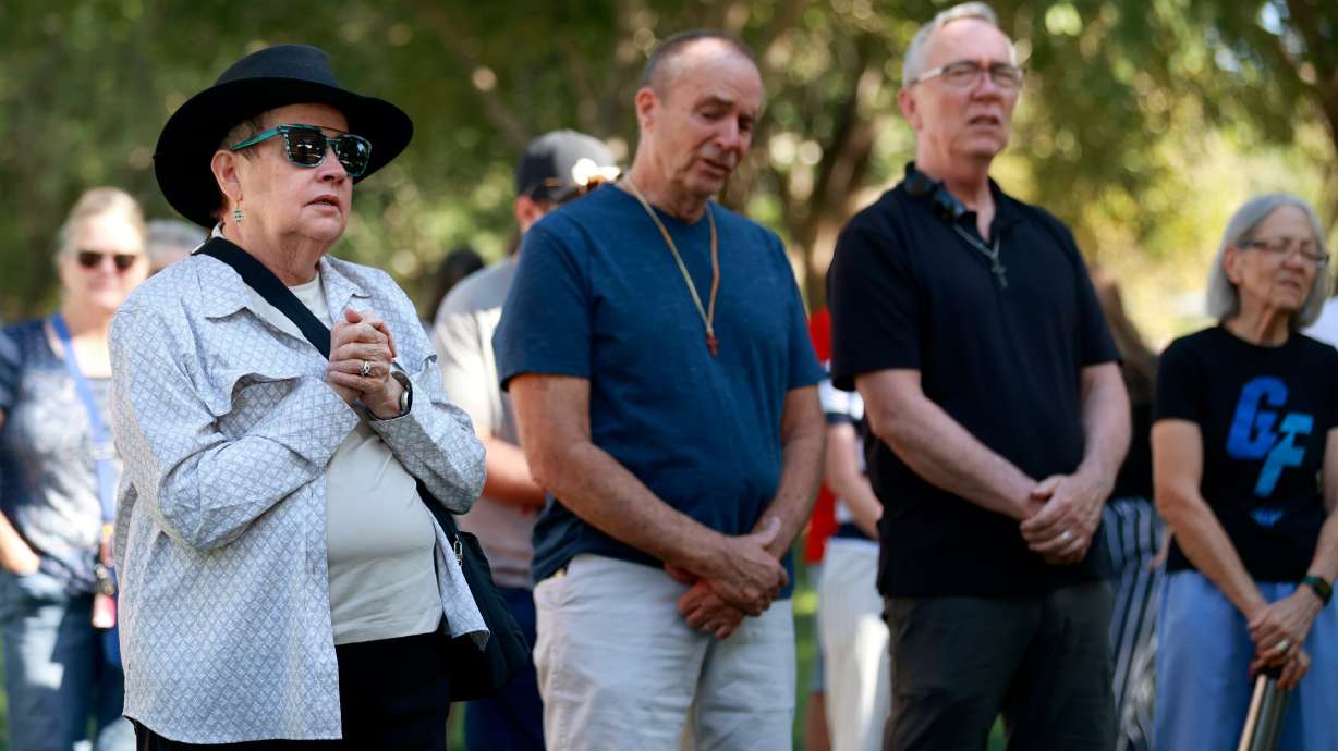 Judy Oberdick prays during an ecumenical community prayer gathering called Pray Without Ceasing, held in the wake of the shooting of Charlie Kirk, at Vernon Worthen Park in St. George on Saturday. Tyler Robinson, who is accused of killing Kirk, lives nearby in Washington. Kirk was a conservative activist and the founder and president of Turning Point USA.