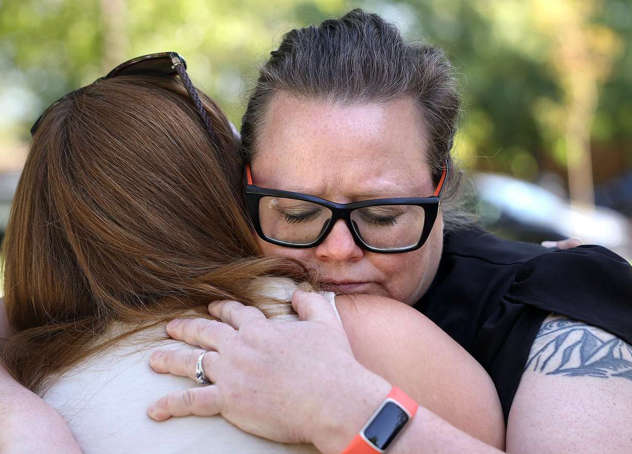 Nicole Rossetti, left, hugs the Rev. Katie Langston, of New Promise Lutheran Church, after an ecumenical community prayer gathering called Pray Without Ceasing, held in the wake of the shooting of Charlie Kirk, at Vernon Worthen Park in St. George on Saturday. Tyler Robinson, who is accused of killing Charlie Kirk, lives nearby in Washington. Kirk was a conservative activist and the founder and president of Turning Point USA.
