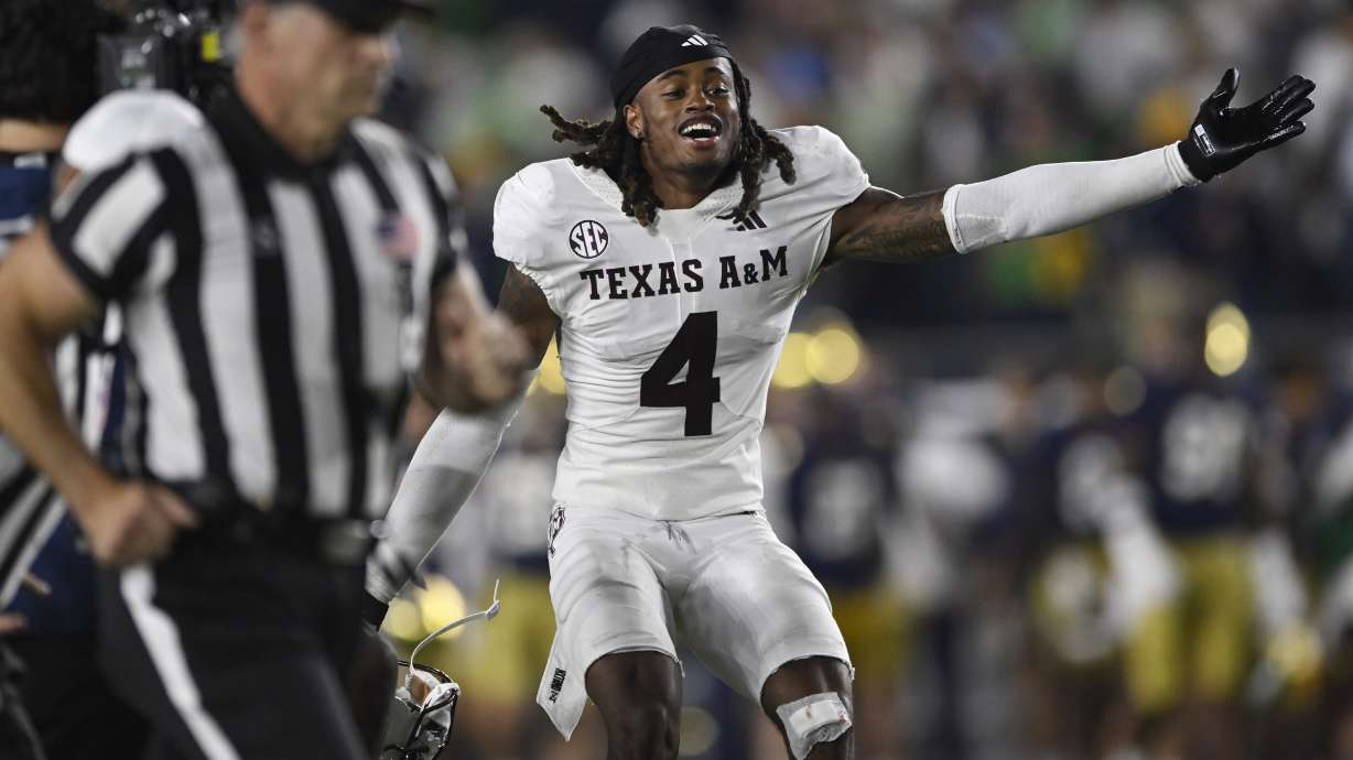 Texas A&M's Will Lee III celebrates after defeating Notre Dame 41-40 in an NCAA football game Saturday, Sept. 13, 2025, in South Bend, Ind.