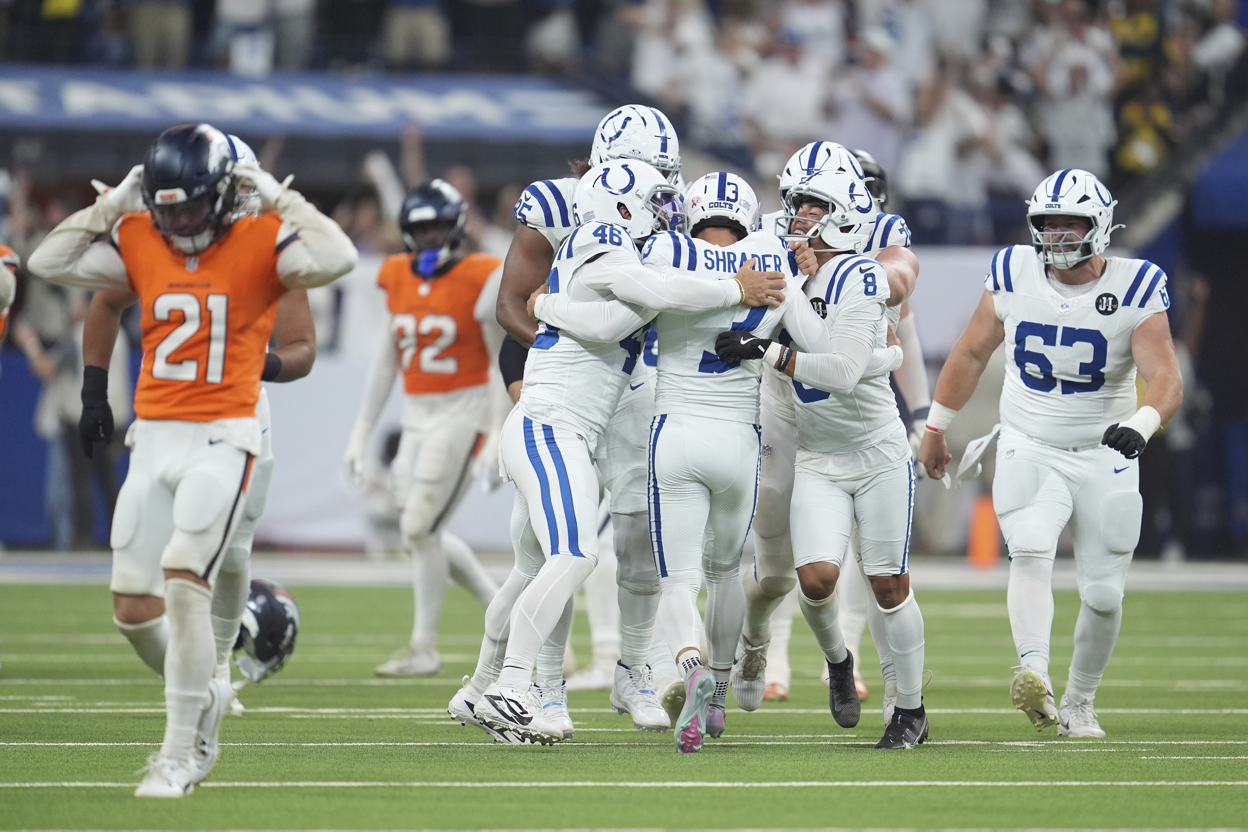 Indianapolis Colts place kicker Spencer Shrader (3) celebrates with teammates after kicking the game winning field goal during the second half an NFL football game against the Denver Broncos, Sunday, Sept. 14, 2025, in Indianapolis. 