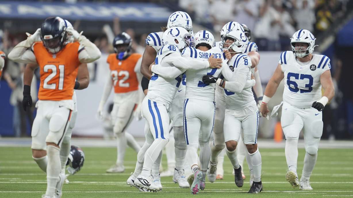 Indianapolis Colts place kicker Spencer Shrader (3) celebrates with teammates after kicking the game winning field goal during the second half an NFL football game against the Denver Broncos, Sunday, Sept. 14, 2025, in Indianapolis.