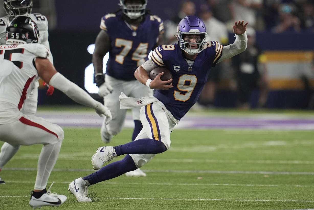 Minnesota Vikings quarterback J.J. McCarthy (9) runs the ball during the second half of an NFL football game against the Atlanta Falcons, Sunday, Sept. 14, 2025, in Minneapolis.