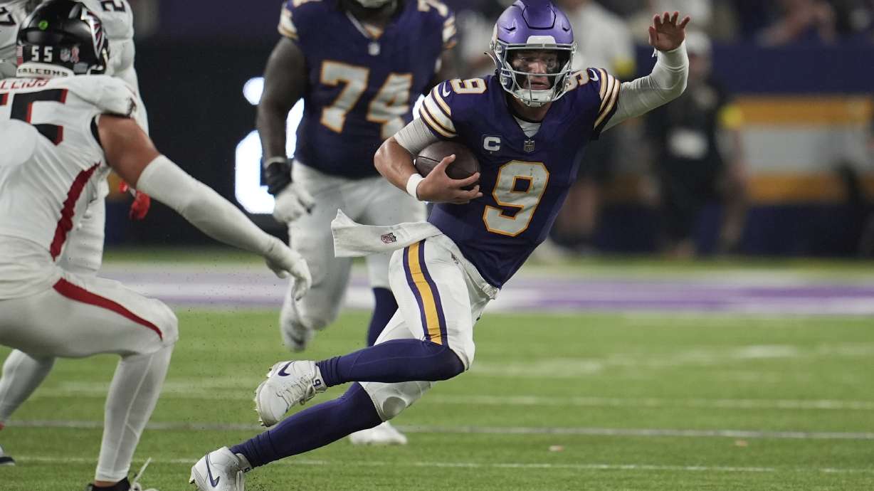Minnesota Vikings quarterback J.J. McCarthy (9) runs the ball during the second half of an NFL football game against the Atlanta Falcons, Sunday, Sept. 14, 2025, in Minneapolis.