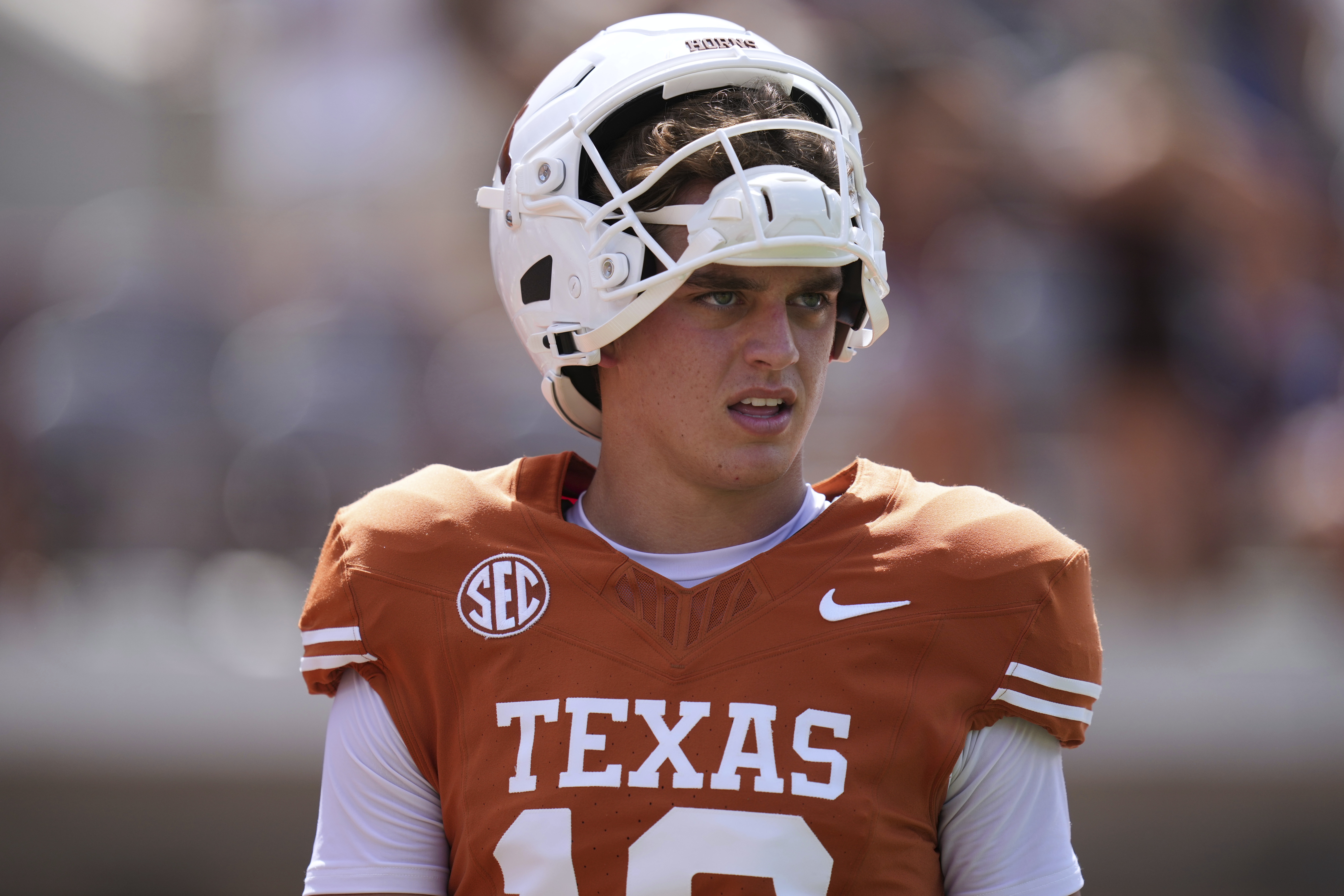 Texas quarterback Arch Manning (16) warms up before an NCAA college football game against UTEP in Austin, Texas, Saturday, Sept. 13, 2025. 