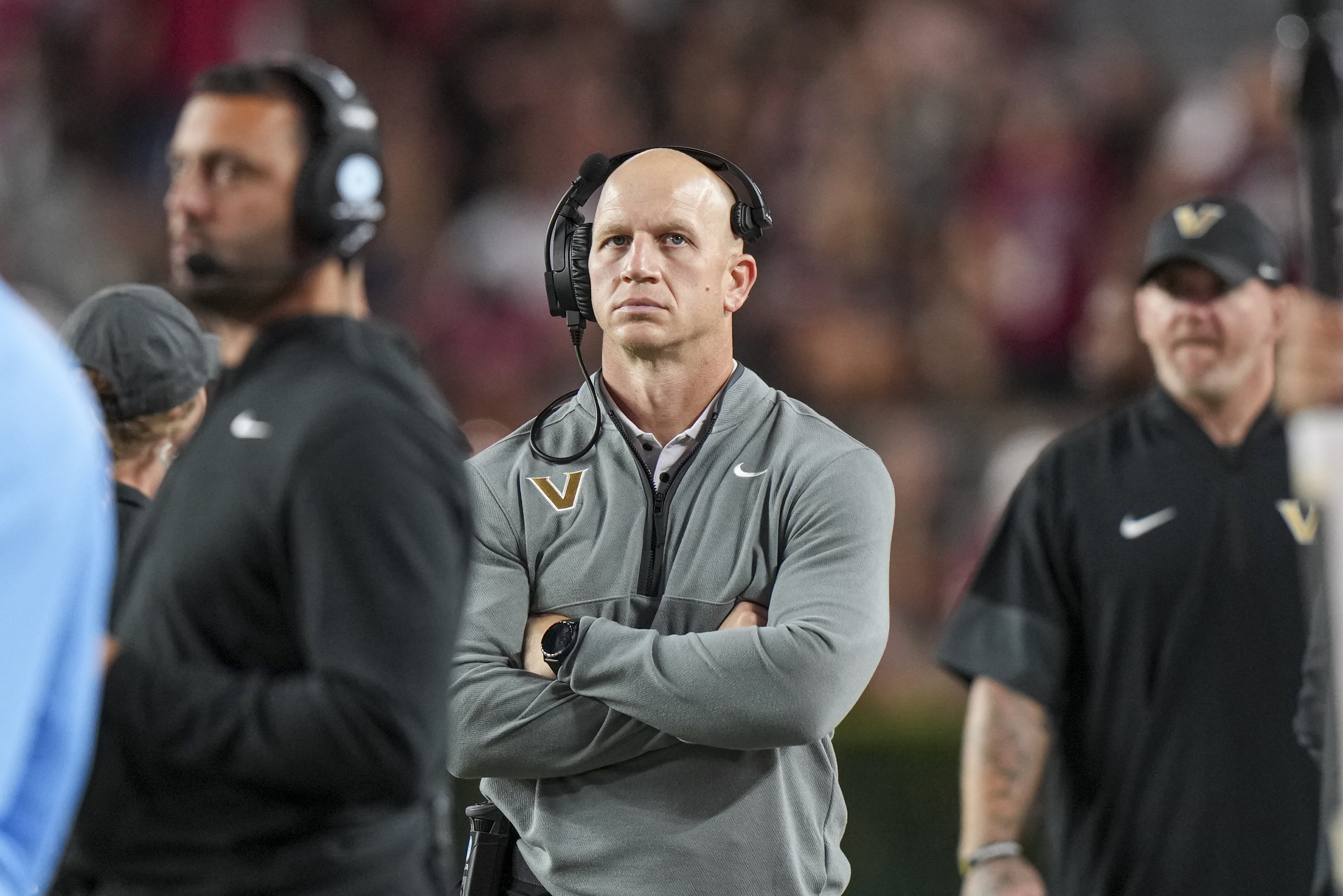 Vanderbilt head coach Clark Lea, center, watches the action from the sideline in the second half of an NCAA college football game against South Carolina, Saturday, Sept. 13, 2025, in Columbia, S.C. 
