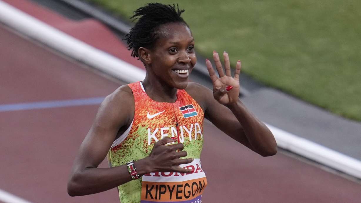 Kenya's Faith Kipyegon celebrates after winning the women's 1,500 meters final at the World Athletics Championships in Tokyo, Tuesday, Sept. 16, 2025.